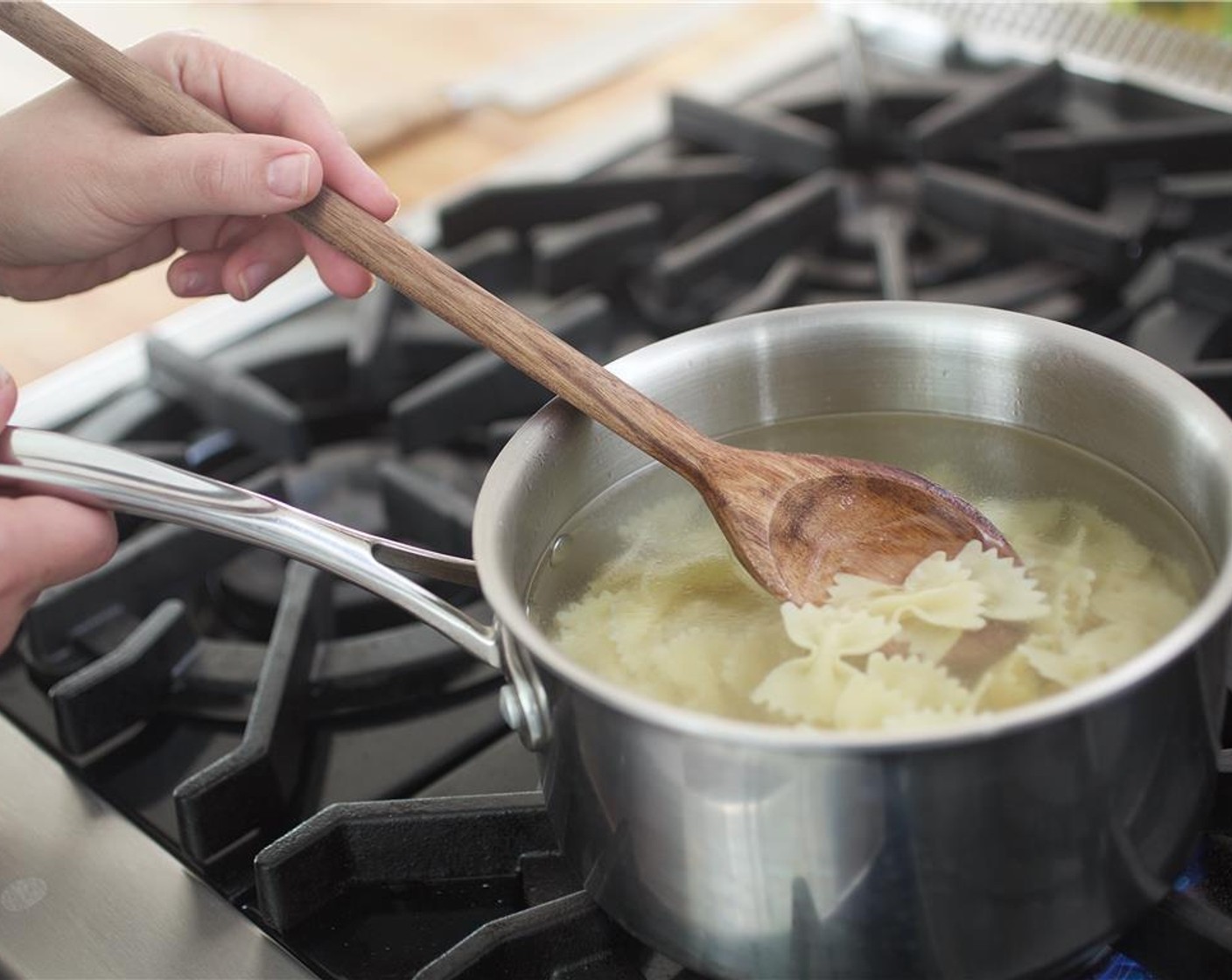 step 5 When water comes to a boil, add Farfalle Pasta (6 oz). Cook for 12 minutes, or until desired texture. Reserve two tablespoons of the pasta water. Drain the pasta into a colander and return to the pot.