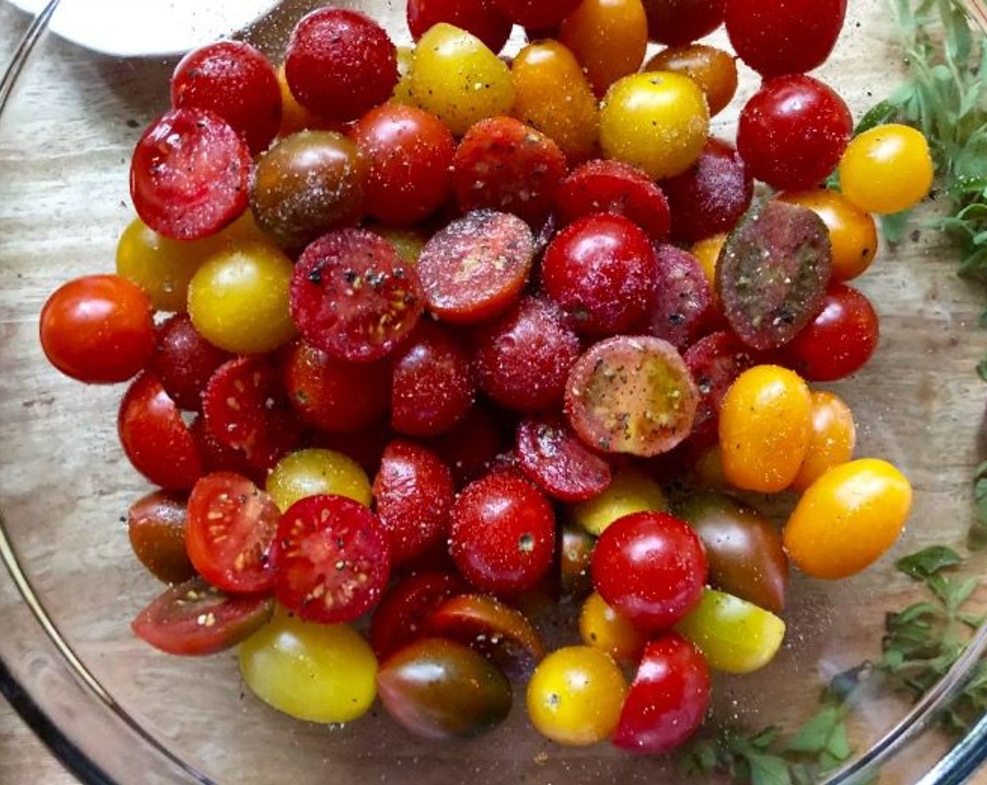 step 9 In a large bowl, toss the Cherry Tomatoes (4 1/2 cups) with the Olive Oil (1 Tbsp). Season with the Salt (1/2 tsp) and Freshly Ground Black Pepper (1/4 tsp).