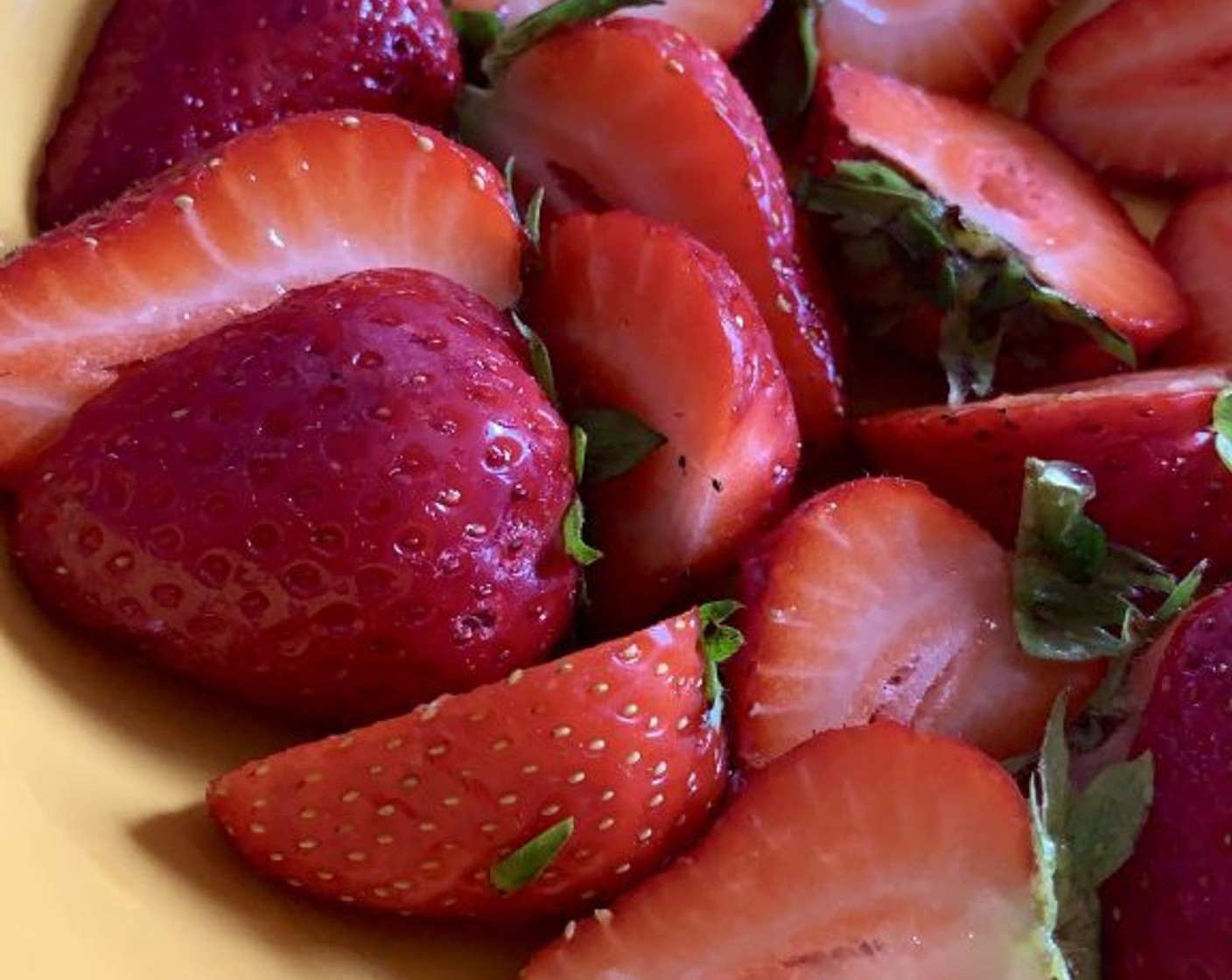 step 11 Wash and cut some more Fresh Strawberries (as needed) in half, squeeze the juice of half a lemon to avoid oxidation.