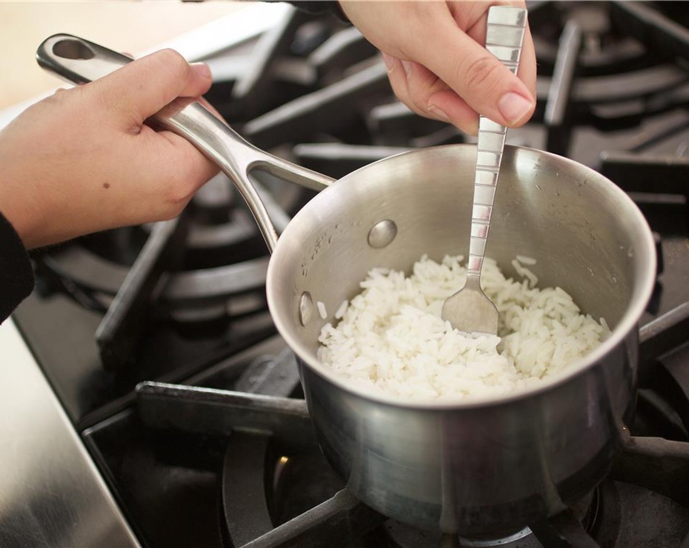 step 7 Add Jasmine Rice (2/3 cup) to saucepan and cover. Reduce heat to medium low and simmer for eleven minutes.