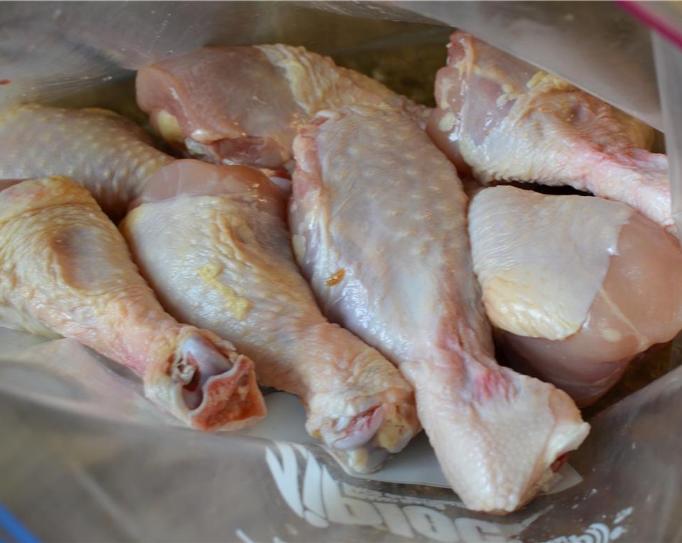 step 1 Rinse and pat dry your Chicken Drumsticks (10) and toss them into a ziplock bag.