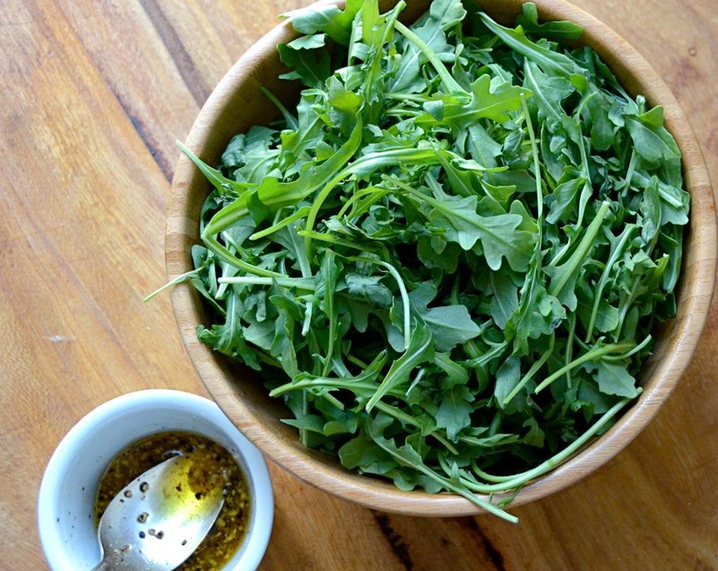 step 11 Place the Baby Arugula (14 cups) into a salad bowl and set aside. In a small bowl combine the Extra-Virgin Olive Oil (3 Tbsp) Red Wine Vinegar (1 Tbsp), Dijon Mustard (1 tsp), minced Garlic (1 clove), Sea Salt (1/2 tsp) and Freshly Ground Black Pepper (1/4 tsp).
