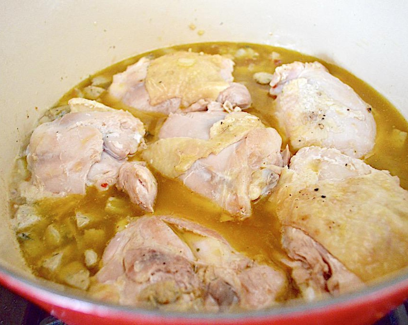 step 4 Then flavor the mixture by stirring in the Dried Tarragon (1/2 tsp),  Dried Parsley (1/2 tsp) and Hot Cherry Pepper Spread (1 Tbsp). Finally, add the chicken back in and pour in the Chicken Stock (1 1/2 cups). Bring the stew up to a boil, then reduce it to a simmer. Cover the pot and let the stew bubble for 15 minutes.