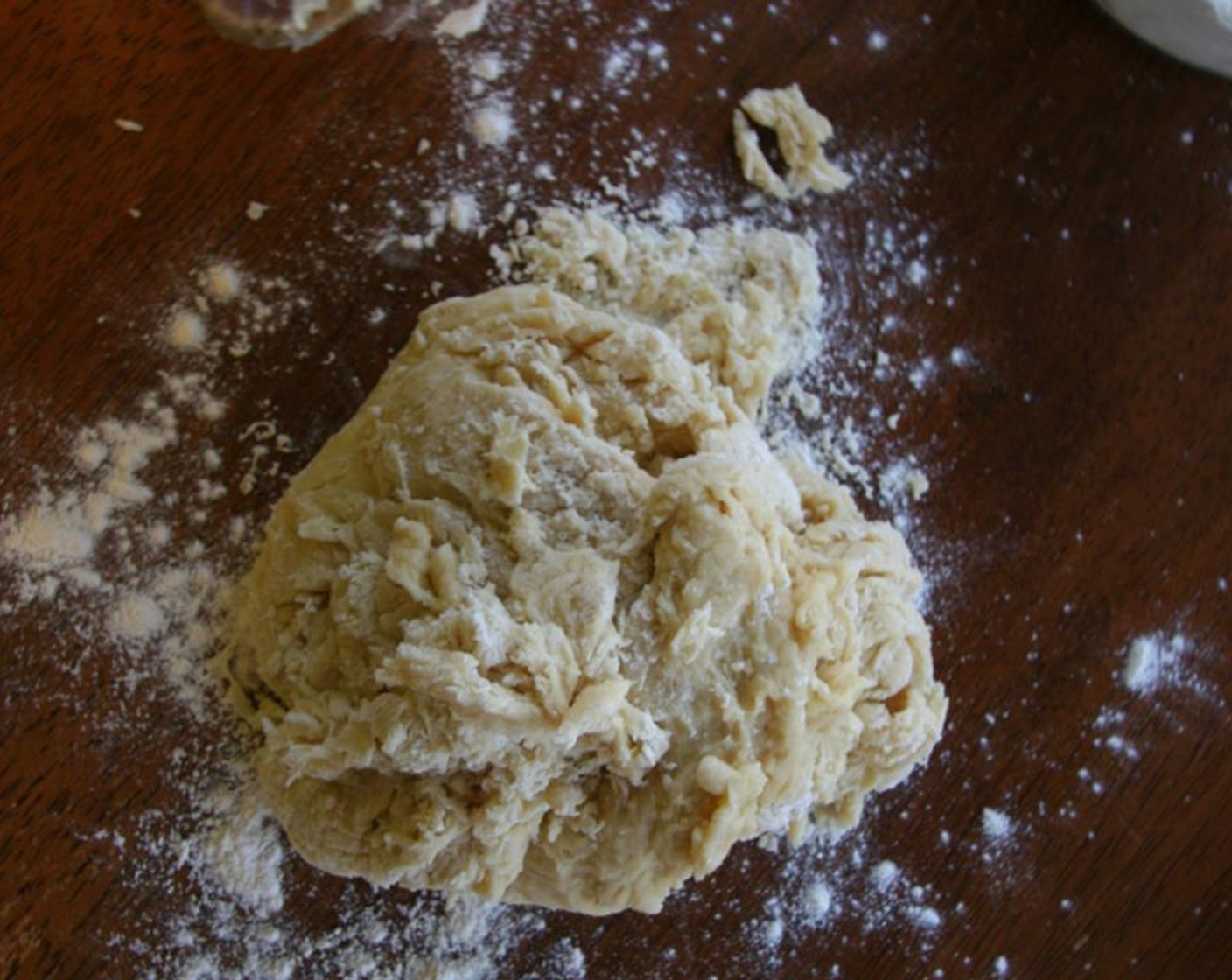 step 4 Continue to add the remaining Unbleached All Purpose Flour (1 3/4 cups) a little at a time until a dough forms.