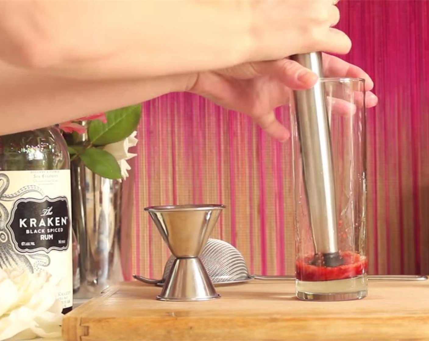 step 2 Cut the top off of the Fresh Strawberry (1), and muddle in a glass.