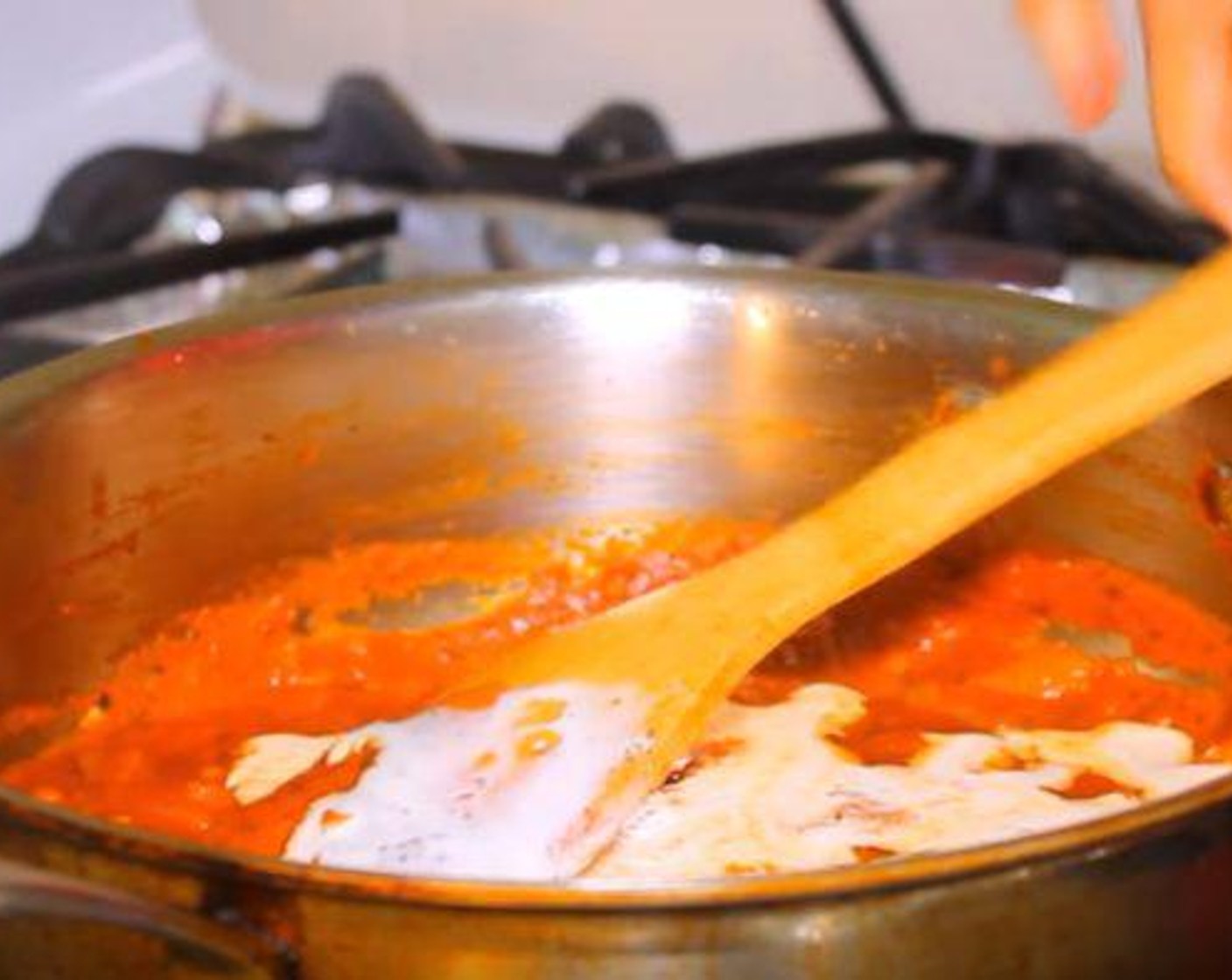 step 3 Add the Garlic (2 cloves) and let cook for a minute. Add the Tomato Sauce (2 cups) and the Dried Basil (1/2 Tbsp).