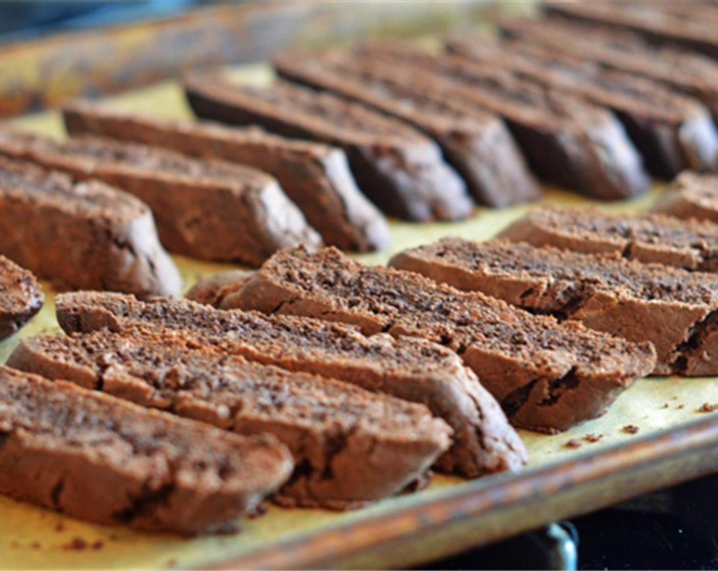 step 11 Turn the biscotti on their sides (so that the cut sides are down) and place back in the oven for 10 minutes to dry and crisp up.