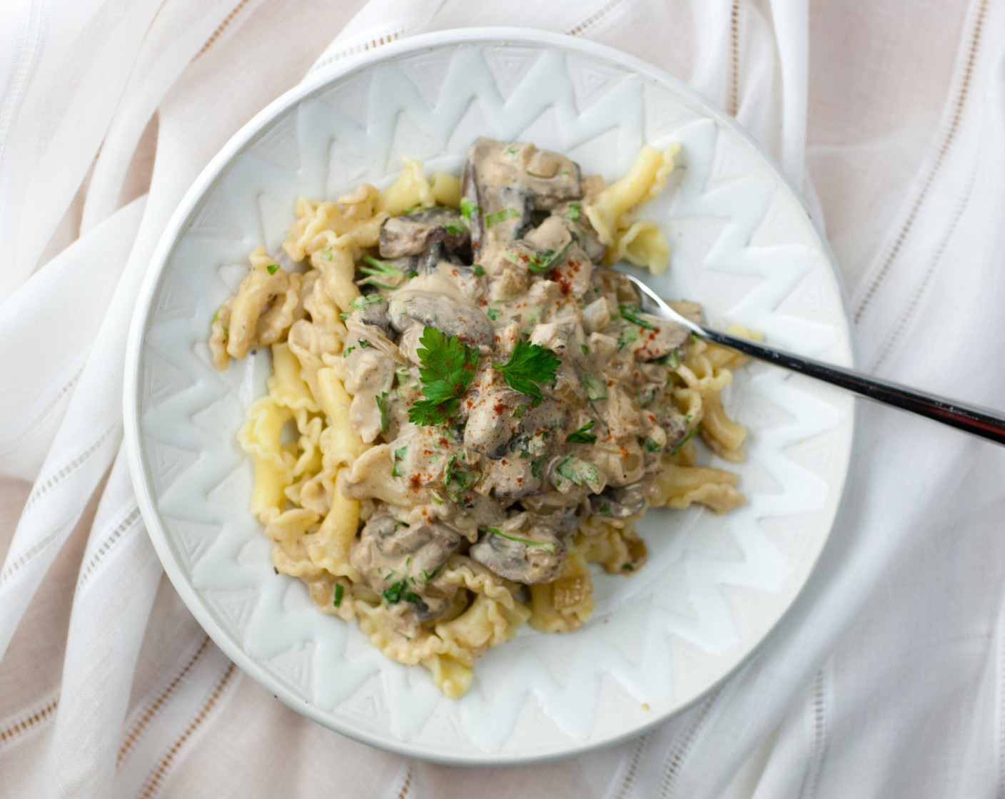 step 5 You can serve this stroganoff two ways. Either add in the pasta and Fresh Parsley (1/2 cup) to the mushrooms and toss to coat, or serve the mushroom mixture over the pasta and sprinkle parsley on top.