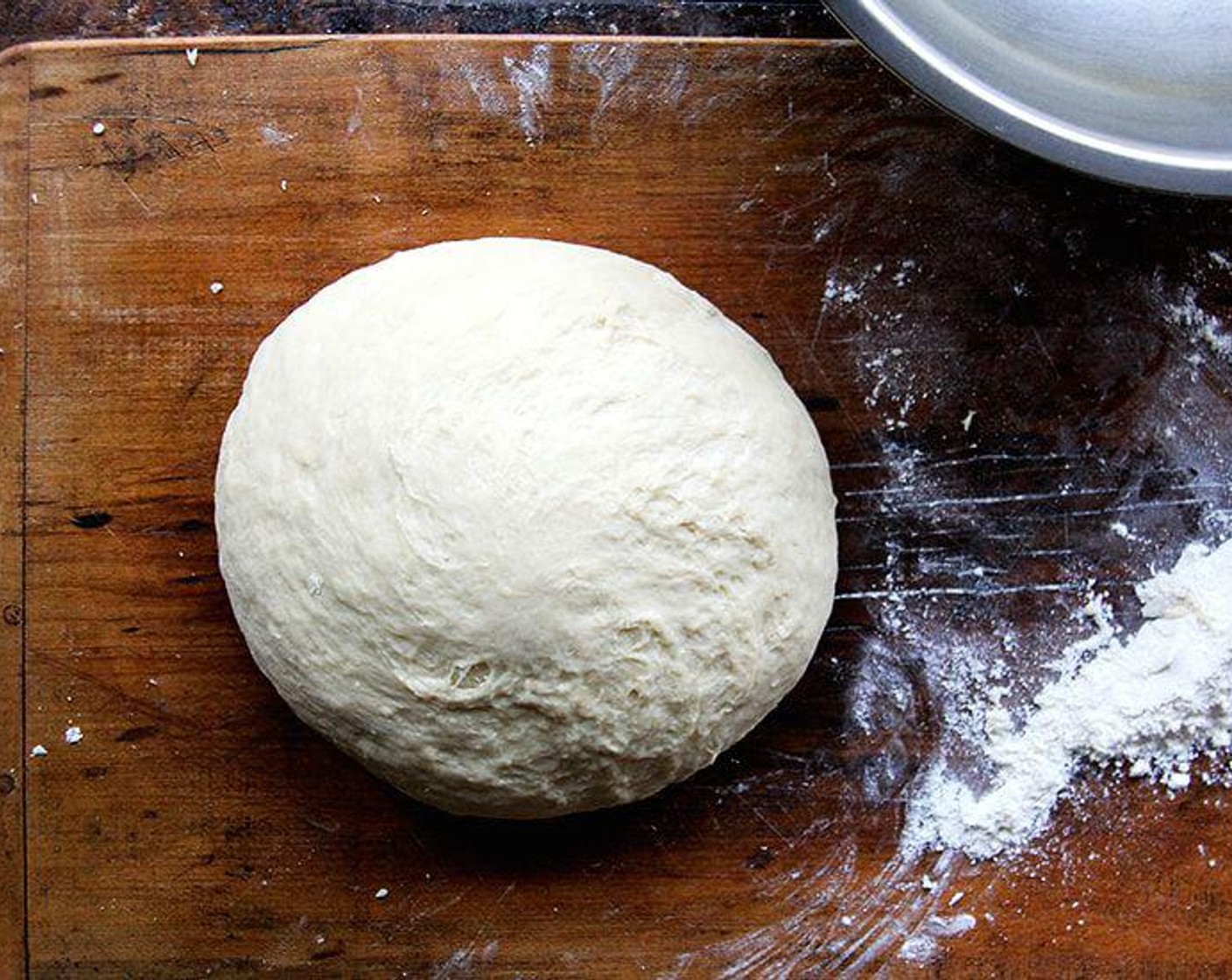 step 5 Add a bit more flour, then turn dough onto lightly floured work surface and knead for just a few minutes, until dough becomes smooth.