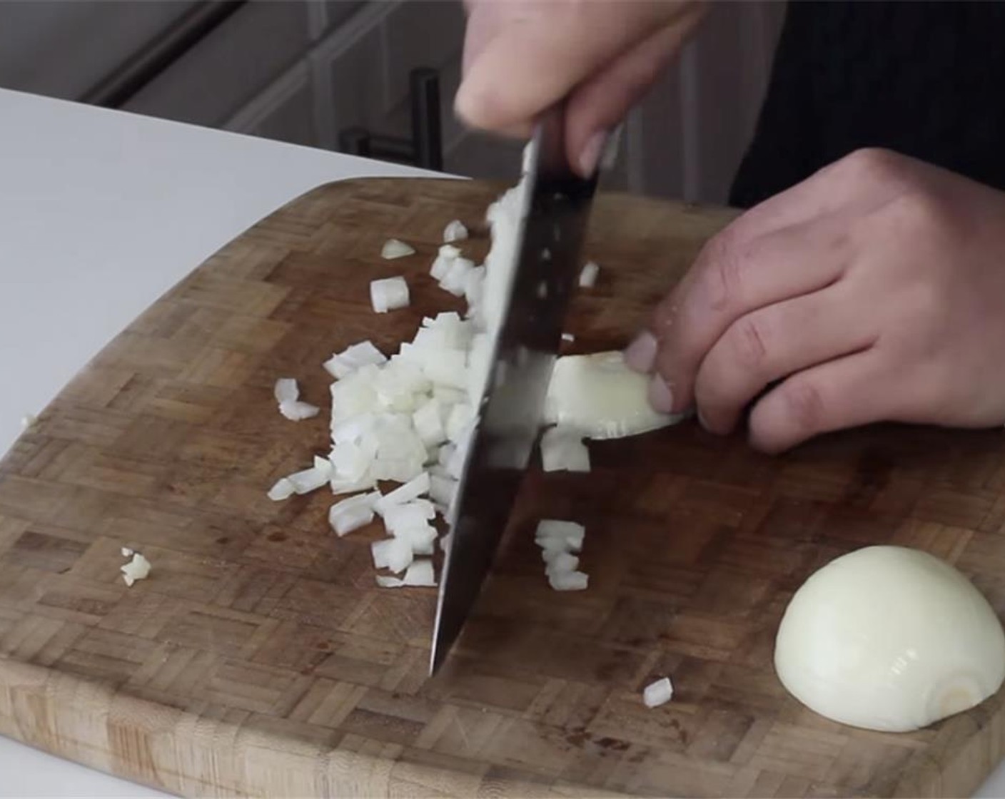 step 3 Dice the Onion (1) and mince the Garlic (2 cloves). Set aside.