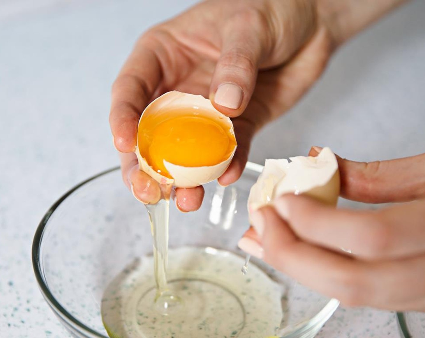 step 1 Separate Eggs (2) by cracking the shell over a bowl, and transferring the yolk back and forth between the halves of the shell. The white will drip into the bowl, and the yolk will remain in one half of the shell.