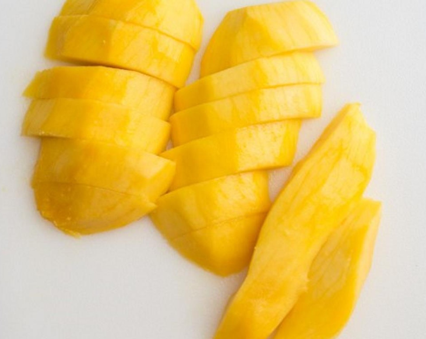 step 1 Peel the skin off the Mango (1) and cut into large chunks.