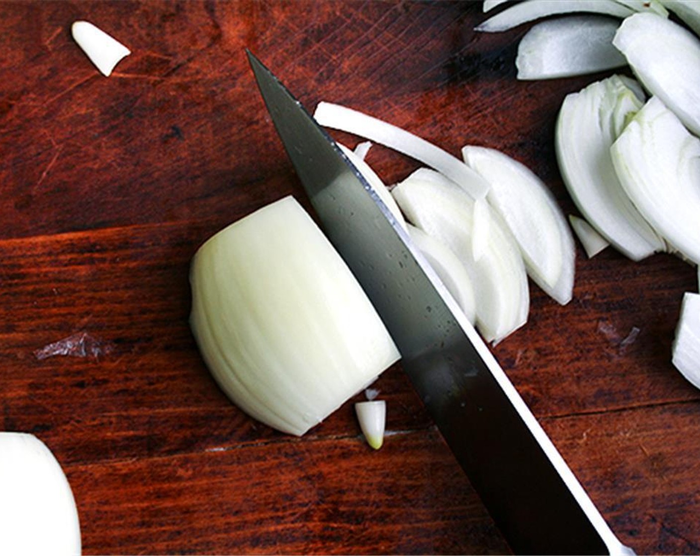 step 5 Slice the onions thinly making cuts perpendicular to the rings.