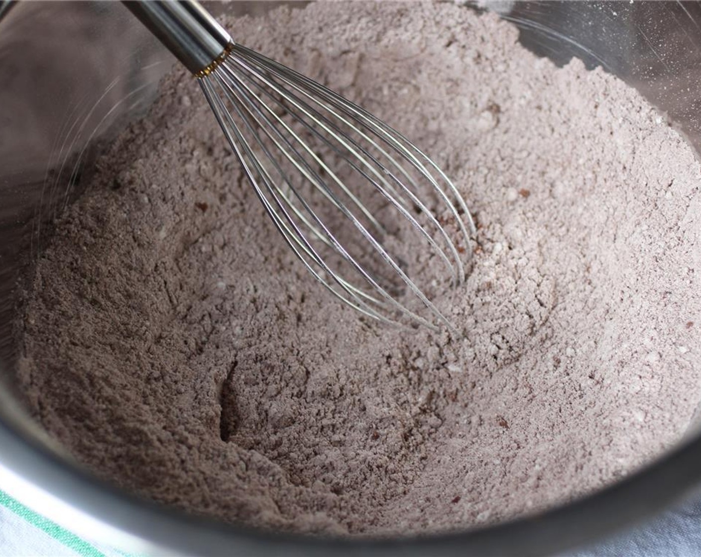 step 4 In a large bowl, mix the Whole Wheat Flour (1 1/2 cups), Baking Soda (3/4 tsp), Salt (3/4 tsp), and Unsweetened Cocoa Powder (1/3 cup) together.