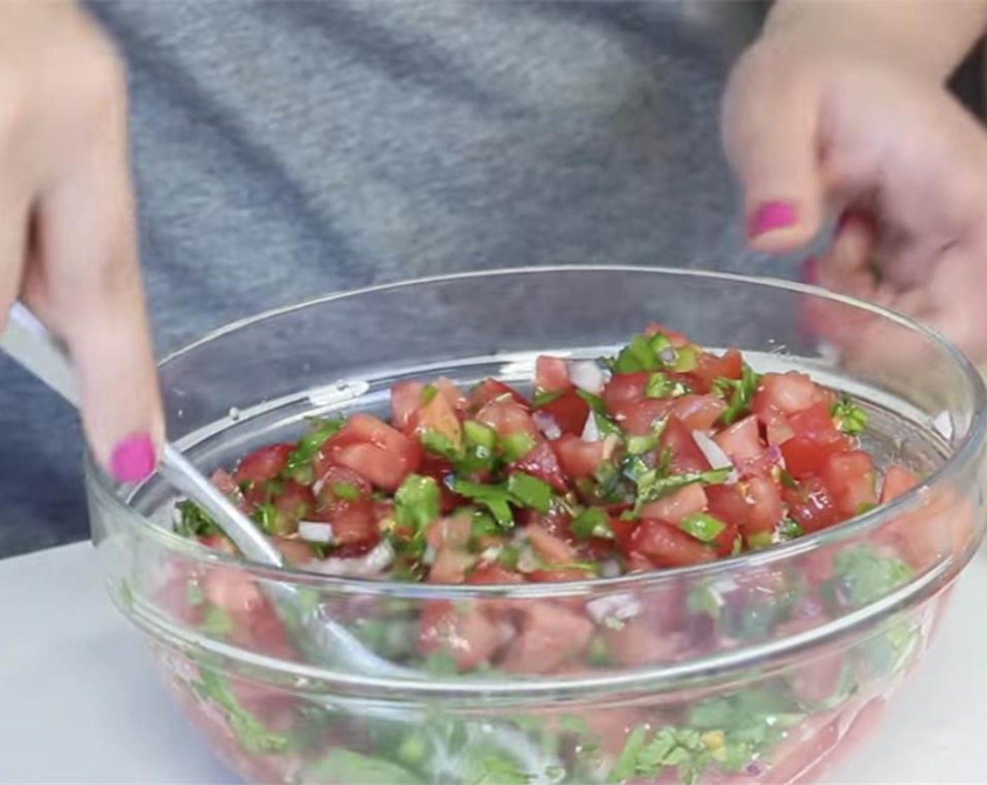 step 5 In a bowl, add the tomatoes, raw onion, chopped cilantro, garlic, Apple Cider Vinegar (2 Tbsp), 2 Tbsp of juice from Limes (2), Olive Oil (1 Tbsp), Agave Syrup (1 tsp), Salt (to taste) and Ground Black Pepper (to taste). Toss and marinate in the fridge for 30 mins.