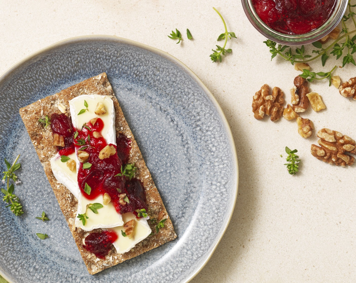 step 2 Top each Crispbread (4 slices) with Brie Cheese (2 oz), Cranberry Relish (4 Tbsp), chopped walnuts, and a sprinkle of Fresh Thyme Leaves (1 tsp). Enjoy!