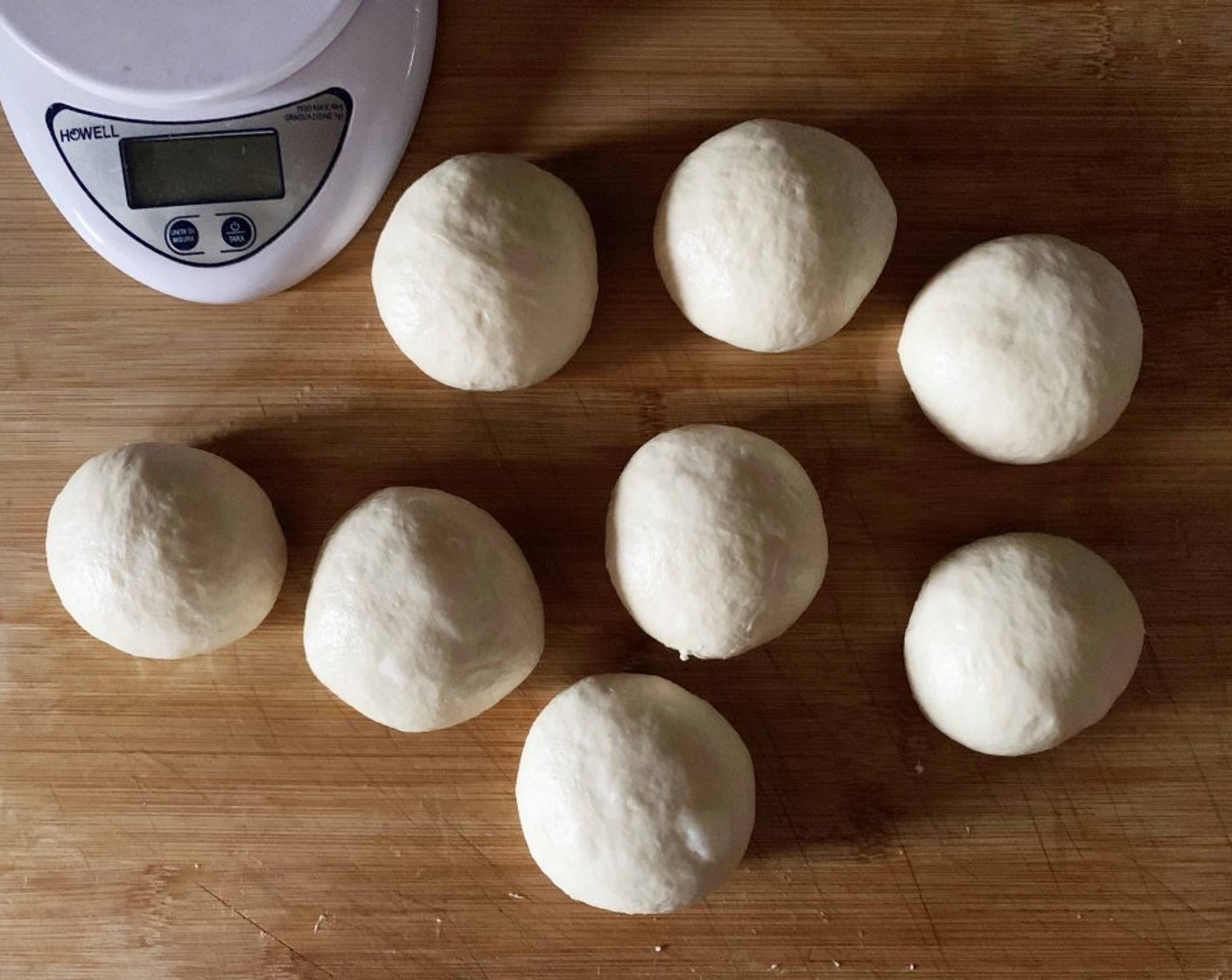step 7 The following day take your day out of the fridge. Cut it up into 7 small balls, each of 85 grams.