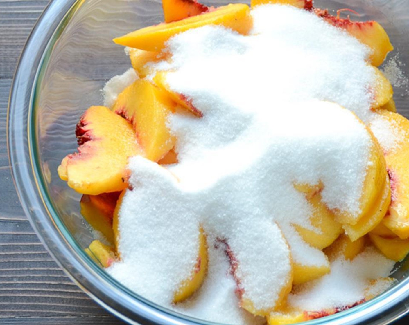 step 1 Add Peaches (9 cups) to a large bowl. Add the Granulated Sugar (1 cup) and toss until peaches are well coated. Let sit for an hour, so the peaches release their juices.