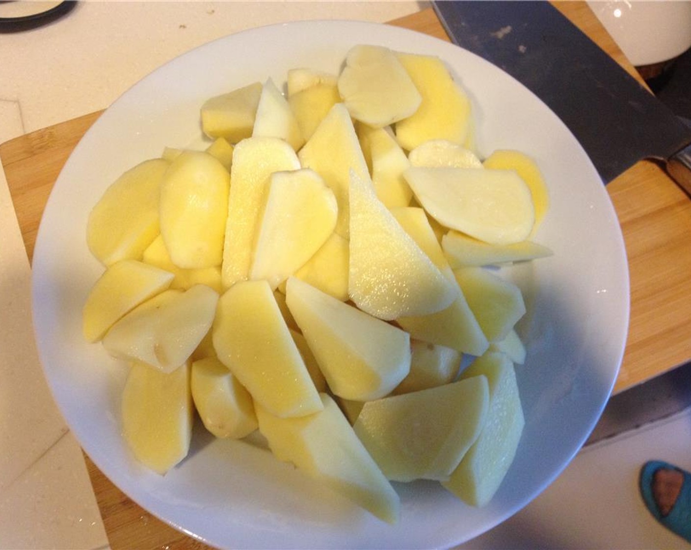 step 1 Peel and chop the Potatoes (4).