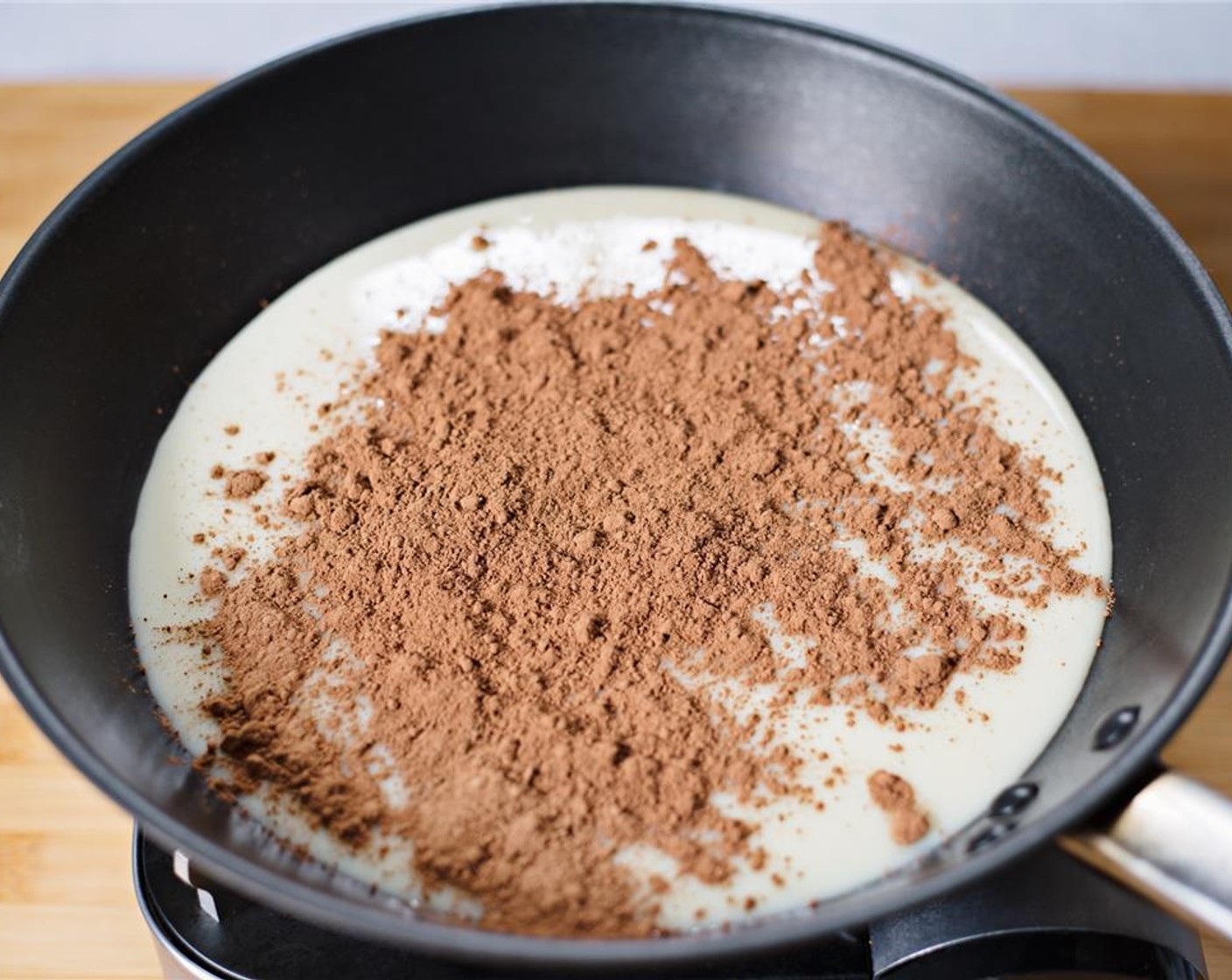 step 5 Add Unsweetened Cocoa Powder (3 Tbsp).