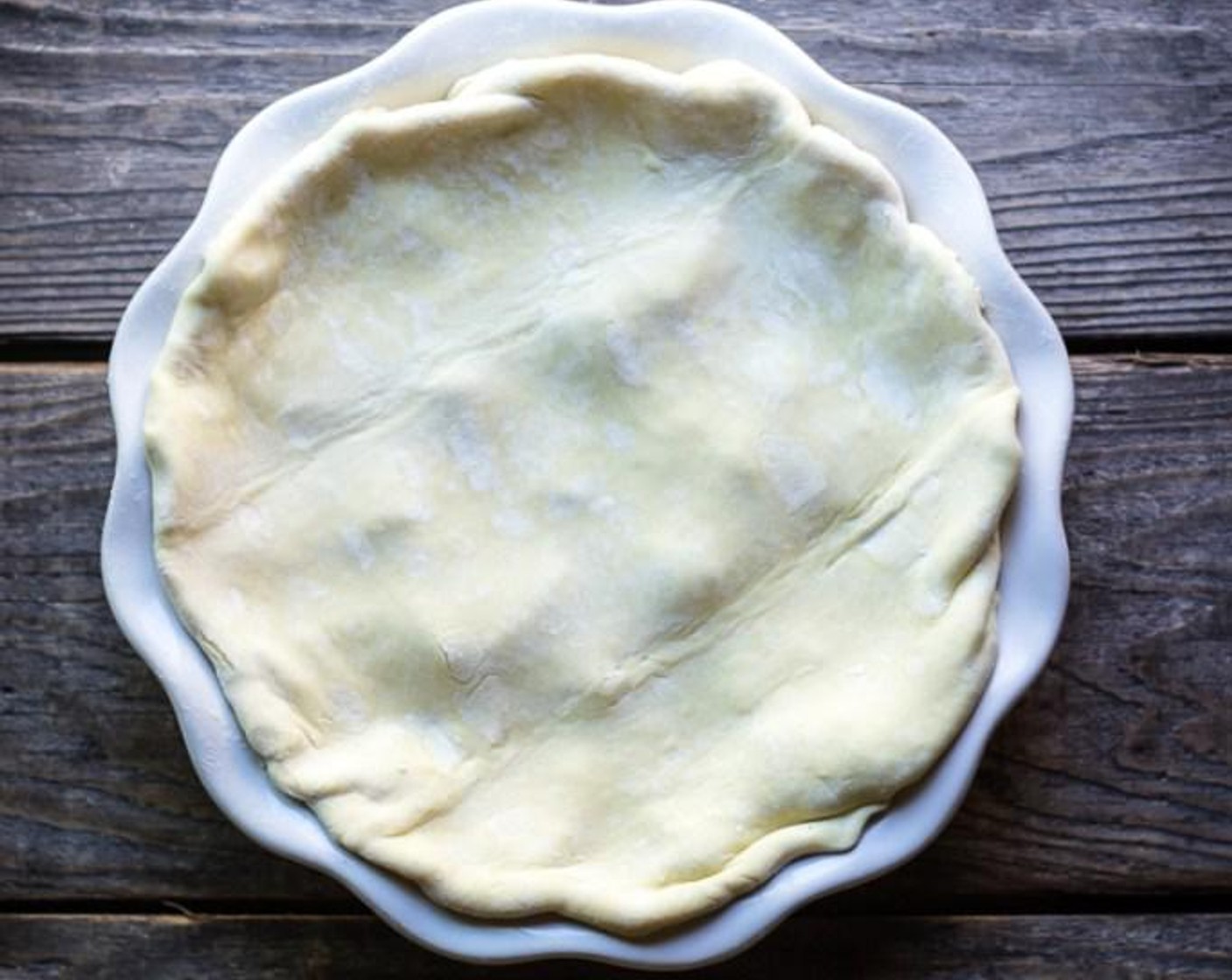 step 9 On a lightly floured surface, roll out your Puff Pastry (1 sheet) until it is large enough to fully cover your baking dish or skillet.