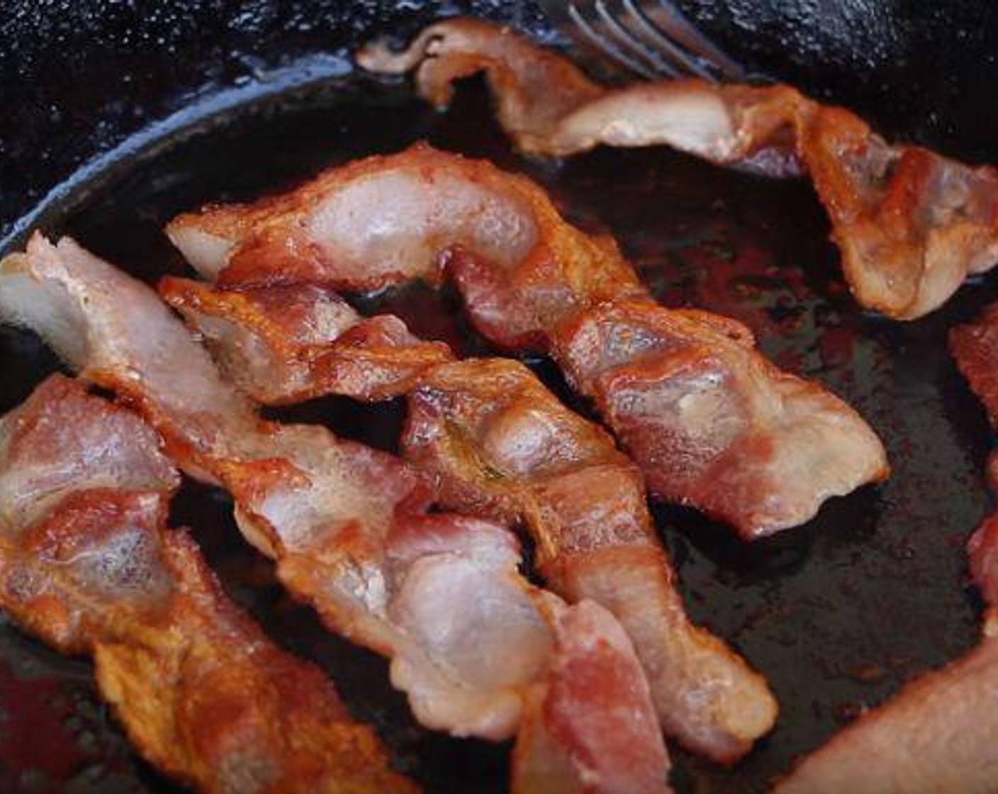 step 1 Cook the Bacon (8 slices) to desired level of doneness. Reserve the grease in the pan that you cooked it in.