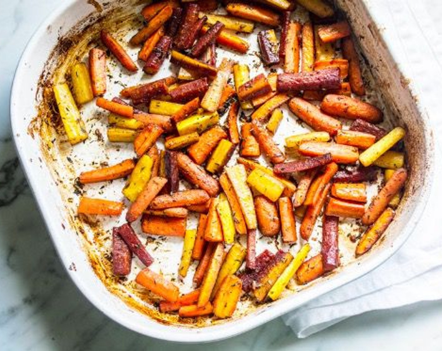 step 6 Bake 30-35 minutes or until carrots are tender and cooked through, stirring every 10 minutes.