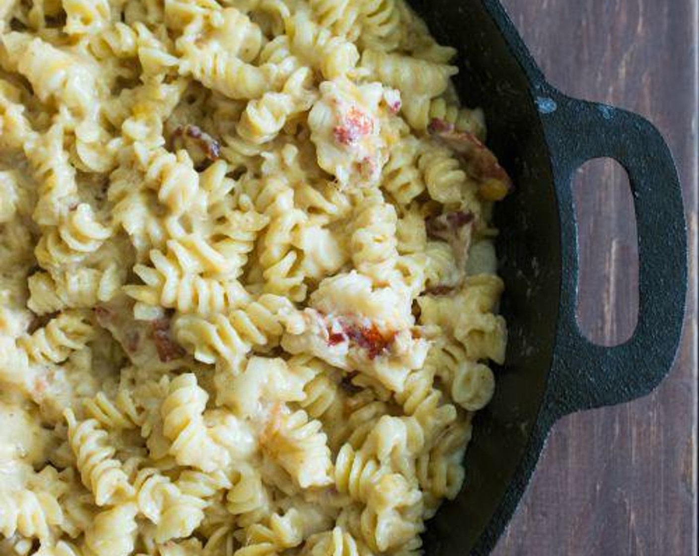 step 6 When all of the cheese is melted, add the Pasta (1 lb). Stir till well combined.