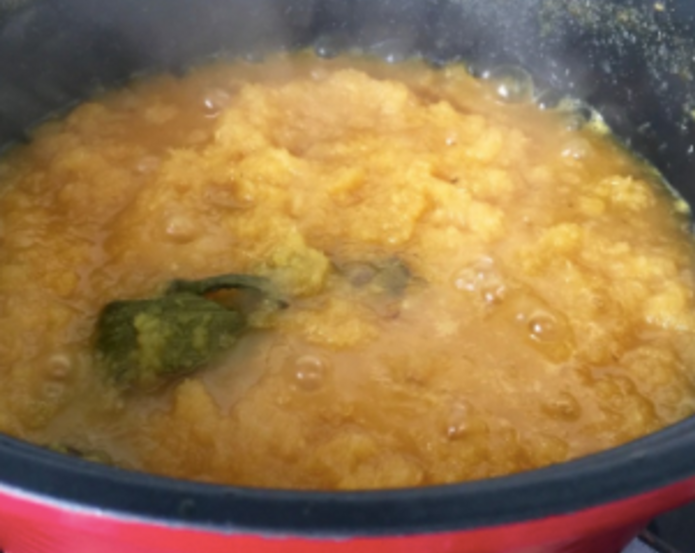 step 19 Continue to cook the pineapple mixture till it starts to brown and dry.