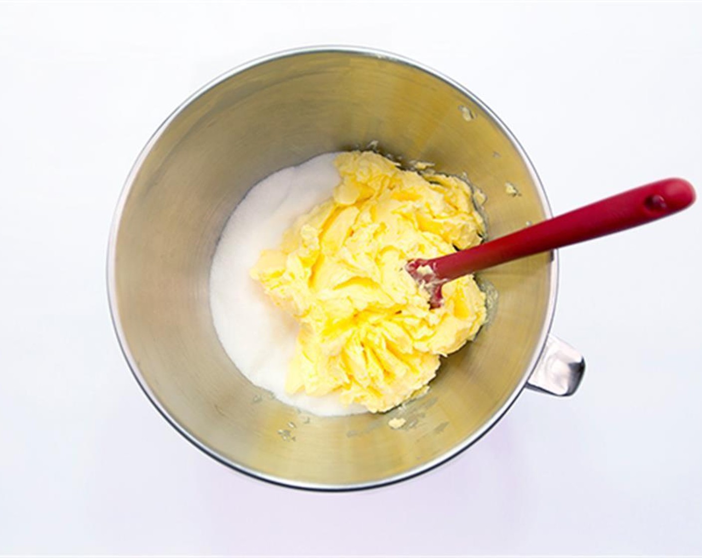 step 2 Beat Granulated Sugar (2 2/3 cups) and Vegetable Shortening (2/3 cup) together in a bowl until fluffy.