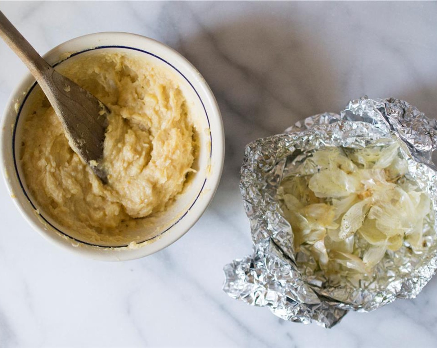 step 5 In a small bowl, combine the unsalted butter, White Miso Paste (1/4 cup) and roasted garlic. Mix until smooth.