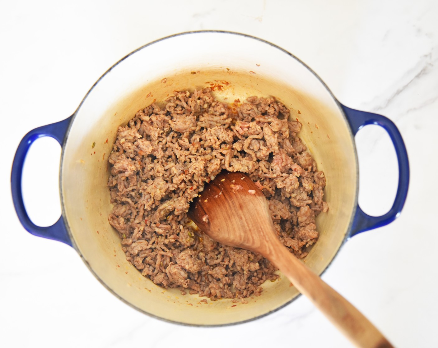 step 2 Add in the Mild Italian Sausage (1 lb) and brown, breaking up large pieces with a
spoon.