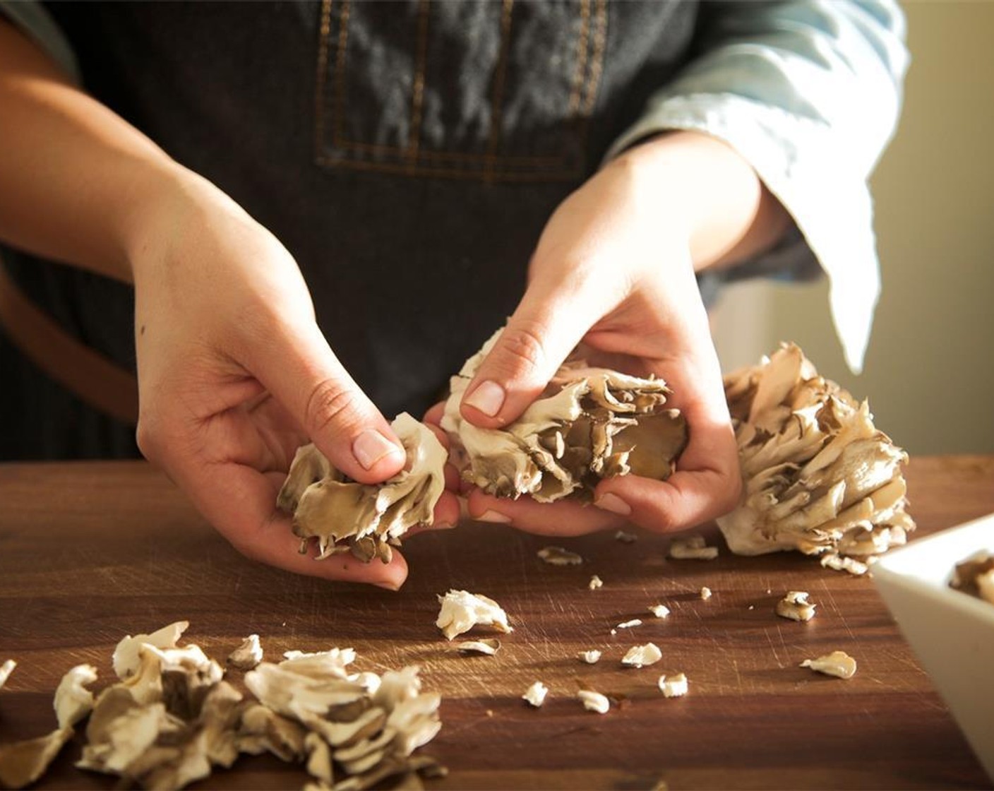 step 2 Remove and discard the stump from the Maitake Mushrooms (2 1/2 cups). Cut into half-inch pieces, and set aside.