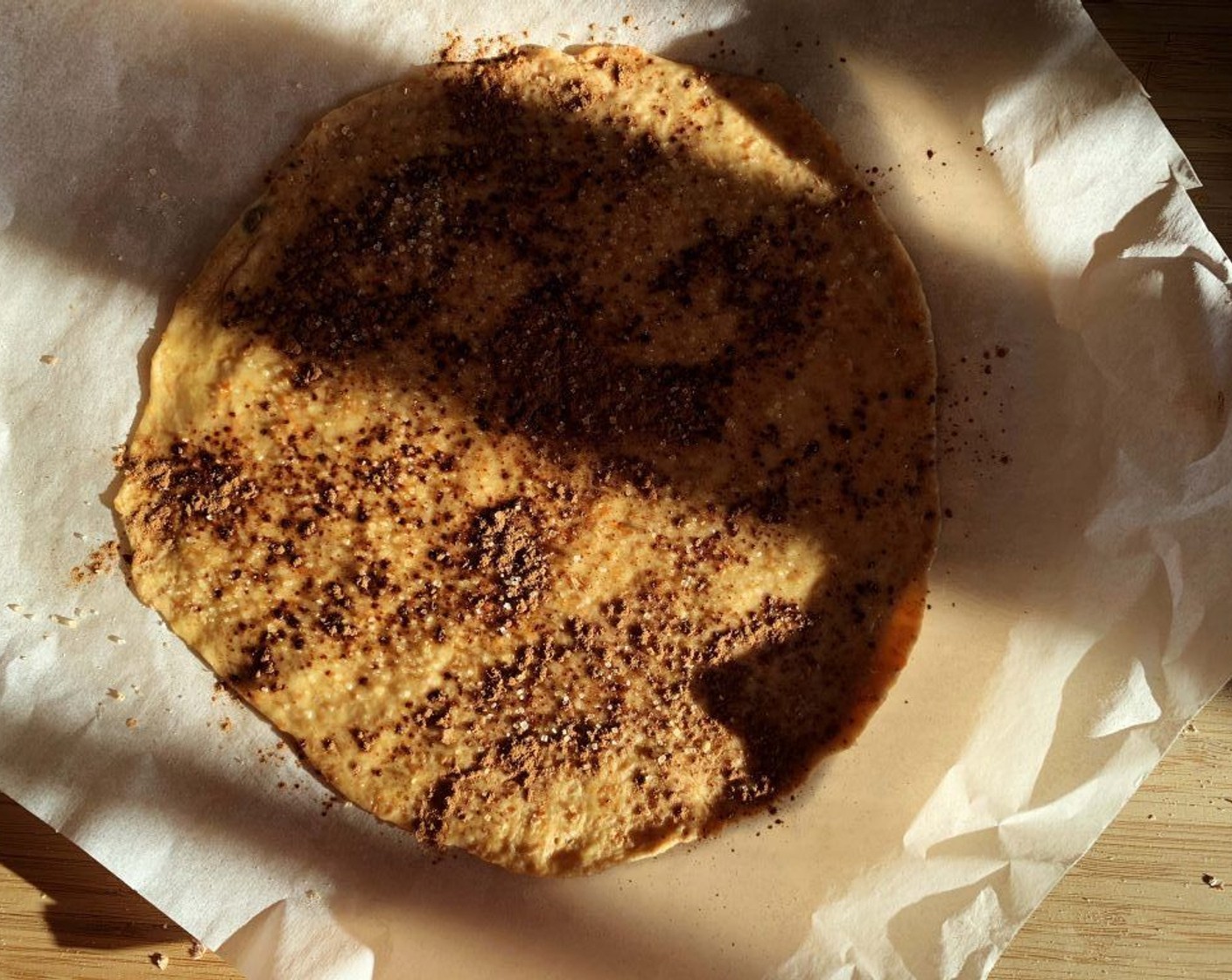 step 6 Roll the first piece into a circle, lightly brush it with Coconut Oil (1 Tbsp) and dust it with some Simply Organic Cinnamon, Ground (to taste) and Cane Sugar (2 Tbsp).