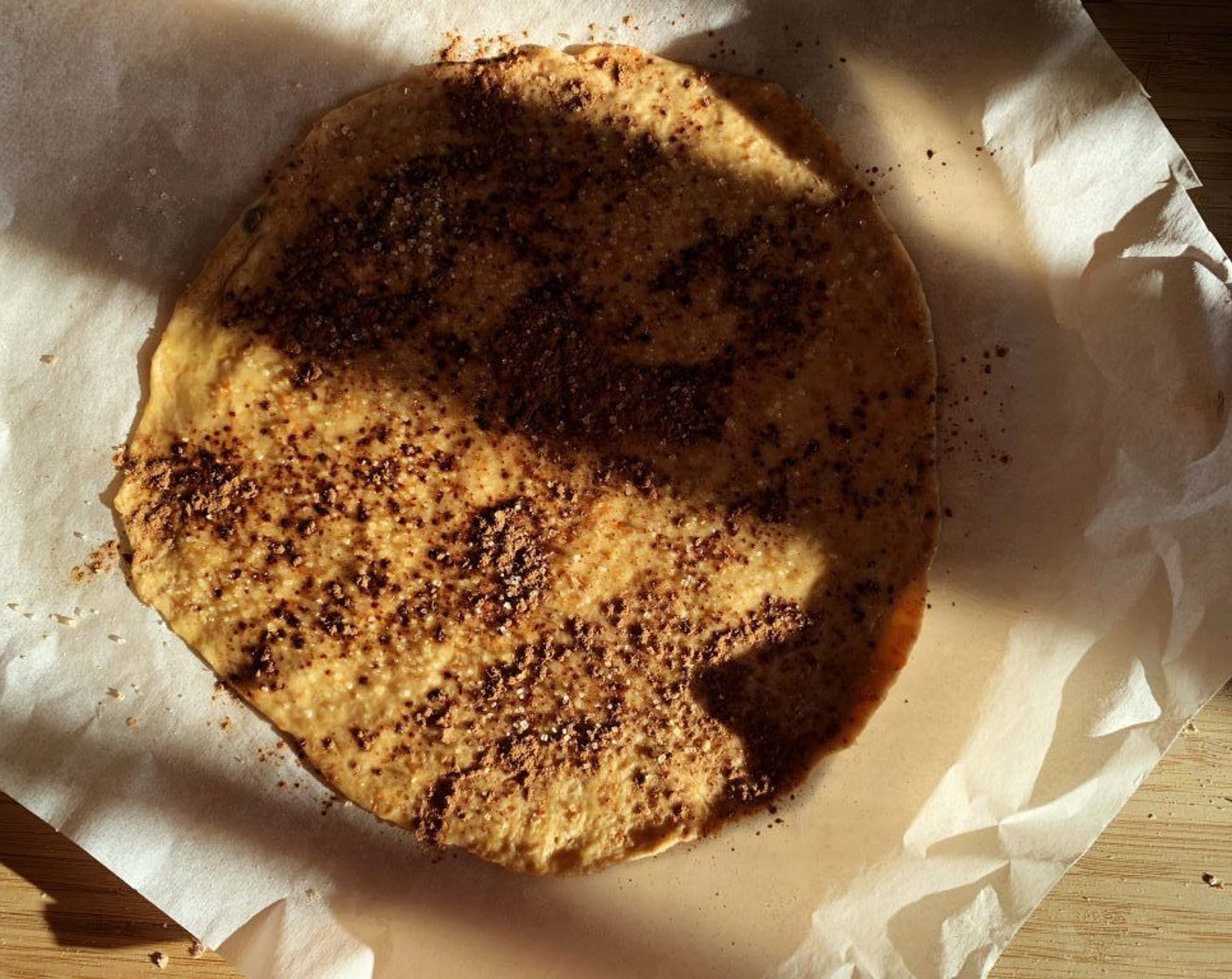 step 6 Roll the first piece into a circle, lightly brush it with Coconut Oil (1 Tbsp) and dust it with some Ground Cinnamon (to taste) and Cane Sugar (2 Tbsp).