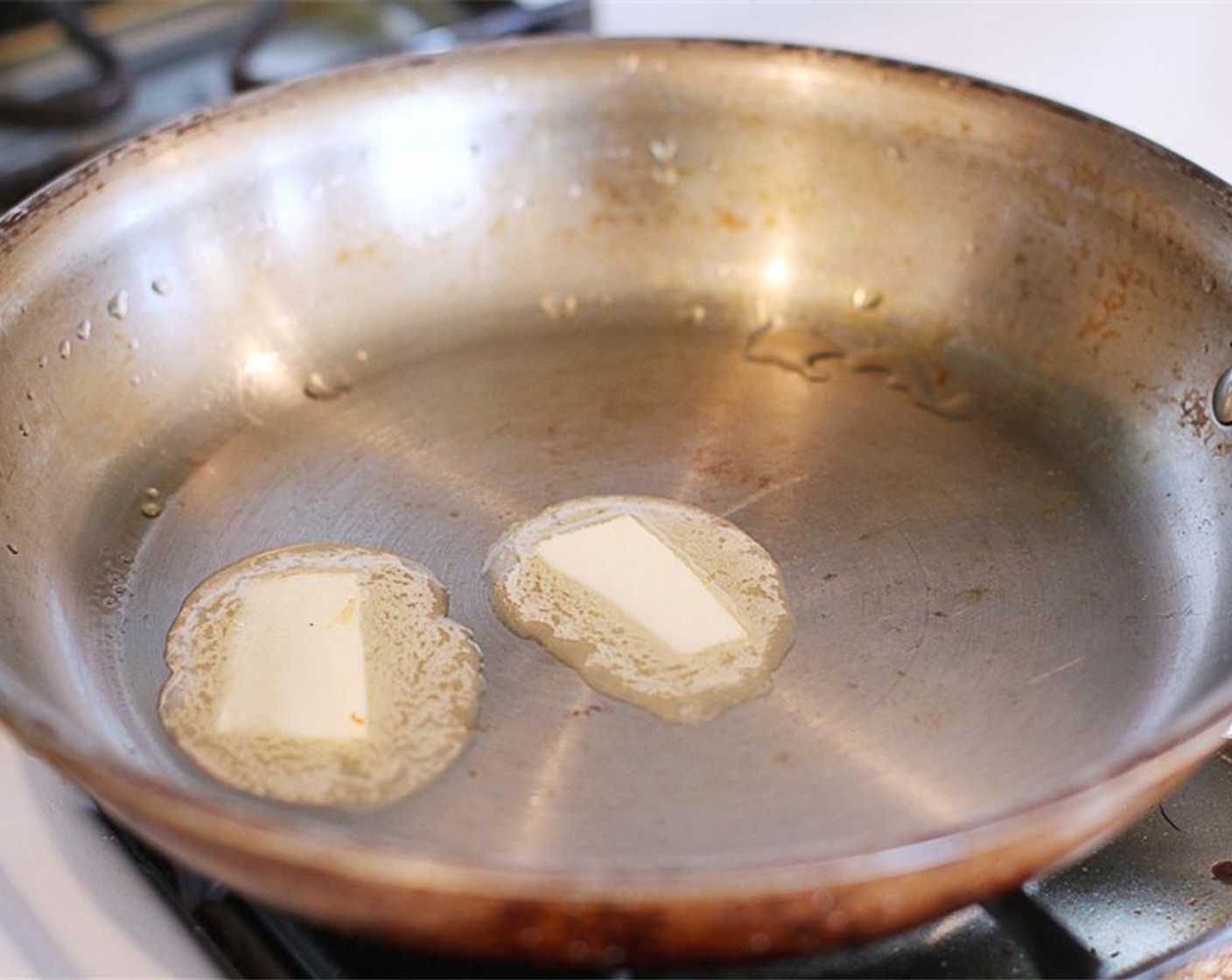 step 1 In a medium size skillet set over medium heat, melt the Unsalted Butter (2 Tbsp).