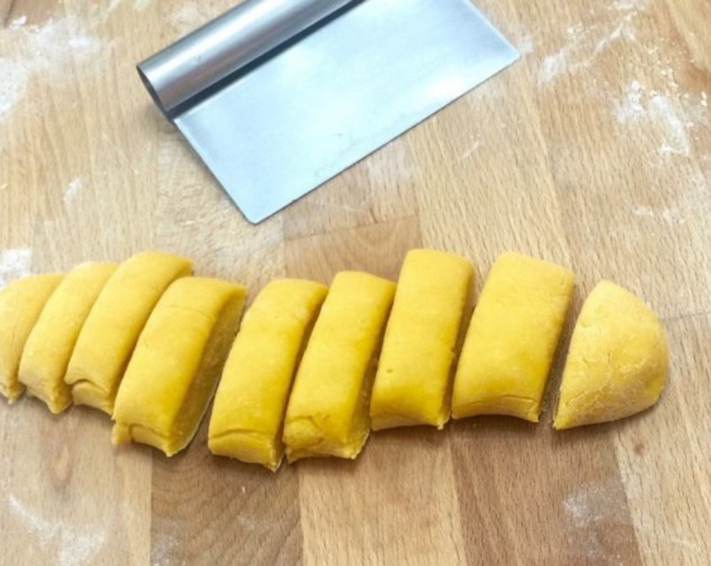 step 9 Roll each half of the dough and cut into small pieces, about 1.5 cm each. You should have 9 pieces.