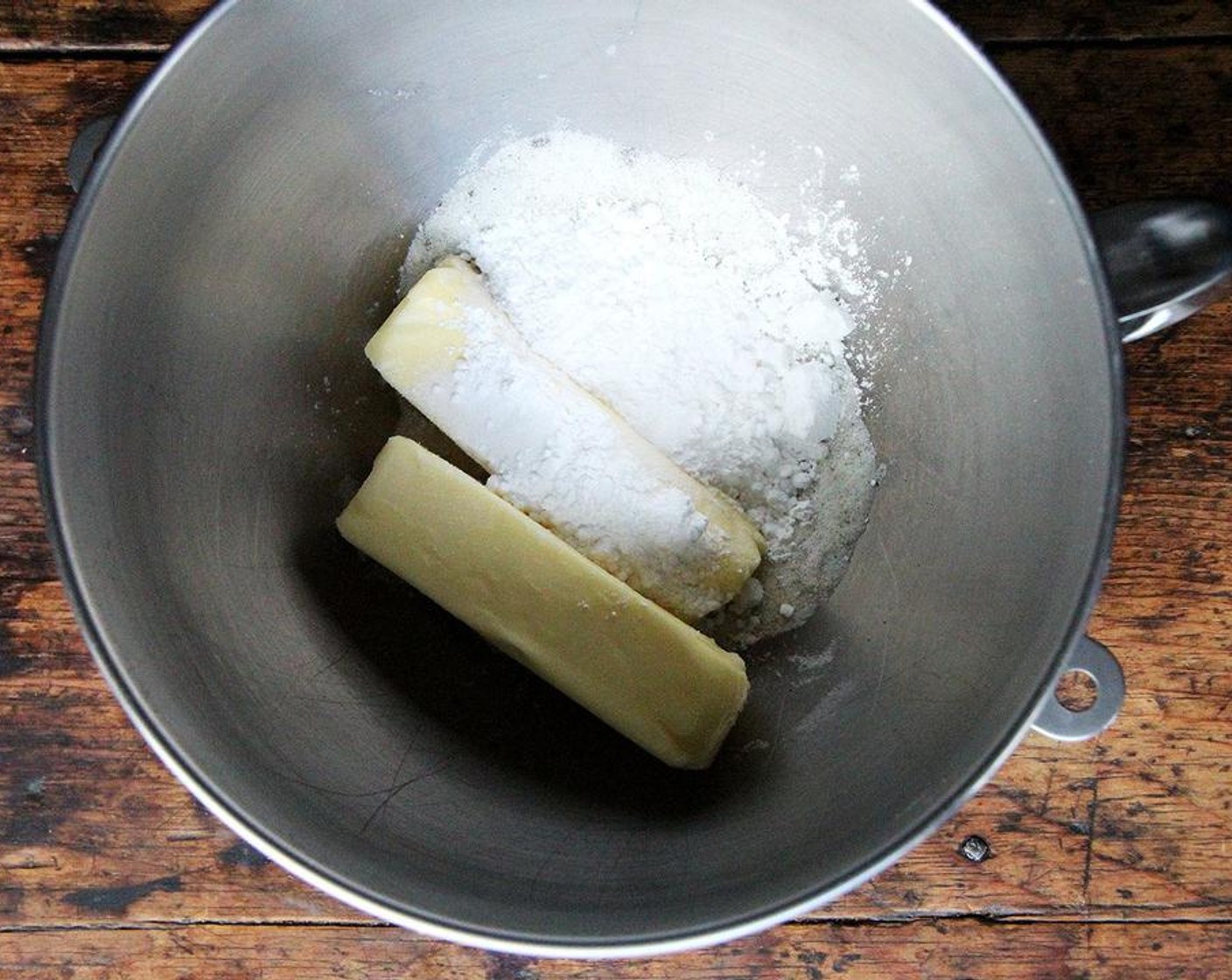 step 2 Add the Unsalted Butter (1 cup), the Powdered Confectioners Sugar (1/3 cup) and Fine Sea Salt (1/2 tsp) to the bowl. Using the paddle attachment, beat on low speed until the mixture is smooth and creamy (you don’t want it to get light and fluffy), scraping down the sides and bottom of the bowl as needed.