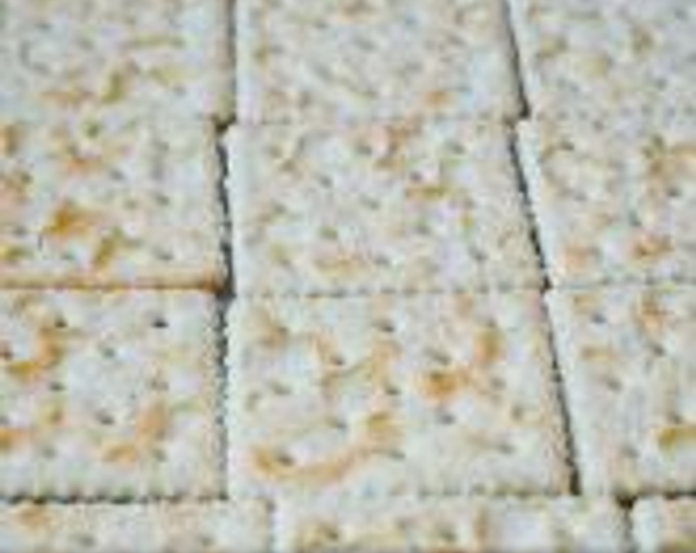 step 2 Lay parchment paper in a 9 by 13-inch baking dish. Add the Saltine Crackers (30) in one layer to the bottom of the dish for the crust.