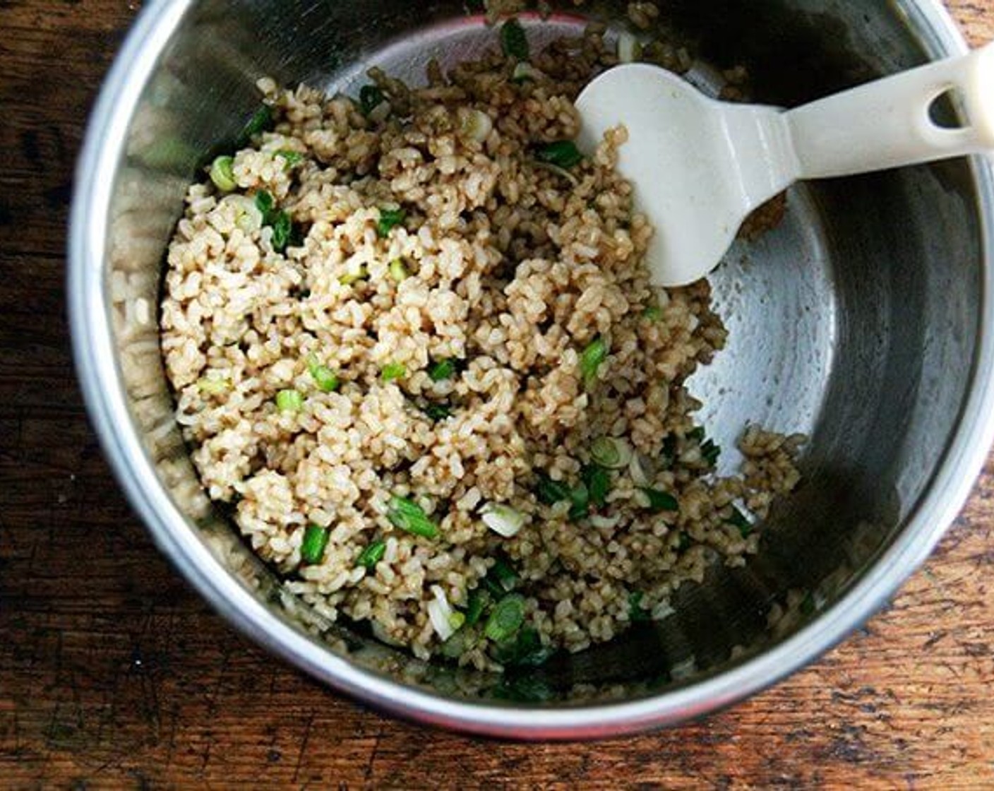 step 2 Add Scallion (1 bunch) to the pot along with Soy Sauce (1 Tbsp), Sesame Oil (1/2 Tbsp) and Mirin (1 tsp). Mix them together until combined.