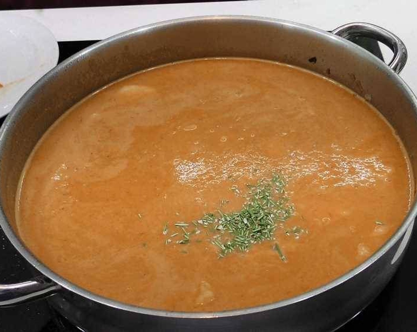 step 4 Clean, peel and dice the Potatoes (2.6 lb) and add them to the pan with the sauce. Add in the leaves of Fresh Rosemary (2 sprigs) as well. Stir well, then add enough Water (to taste) to cover the potatoes and let it cook slowly until the potatoes are nice and soft.