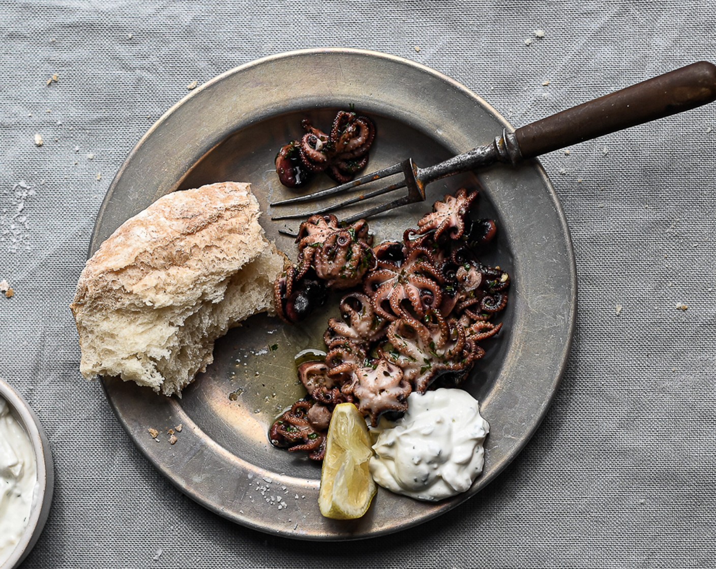 step 6 Serve the baby octopus with creamy tzatziki (greek cucumber sauce) and lots of crusty bread for mopping up the leftover marinade.