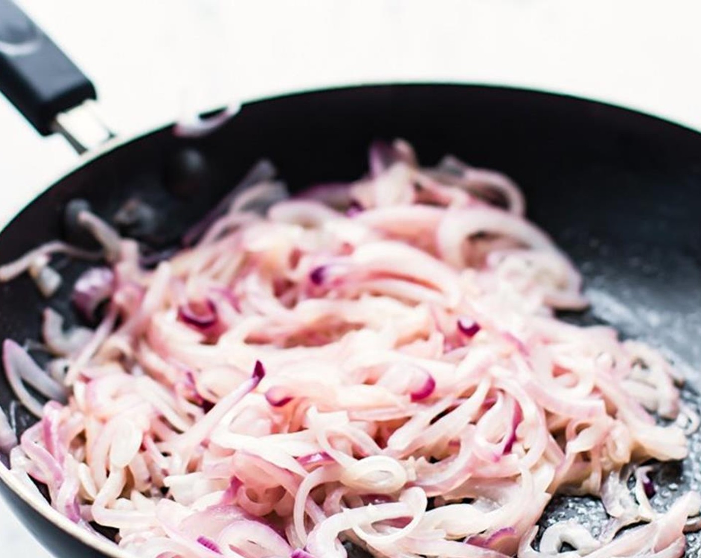 step 1 Clean and peel Red Onion (1). Slice then place in a dry skillet on medium high for five minutes until they start to brown.