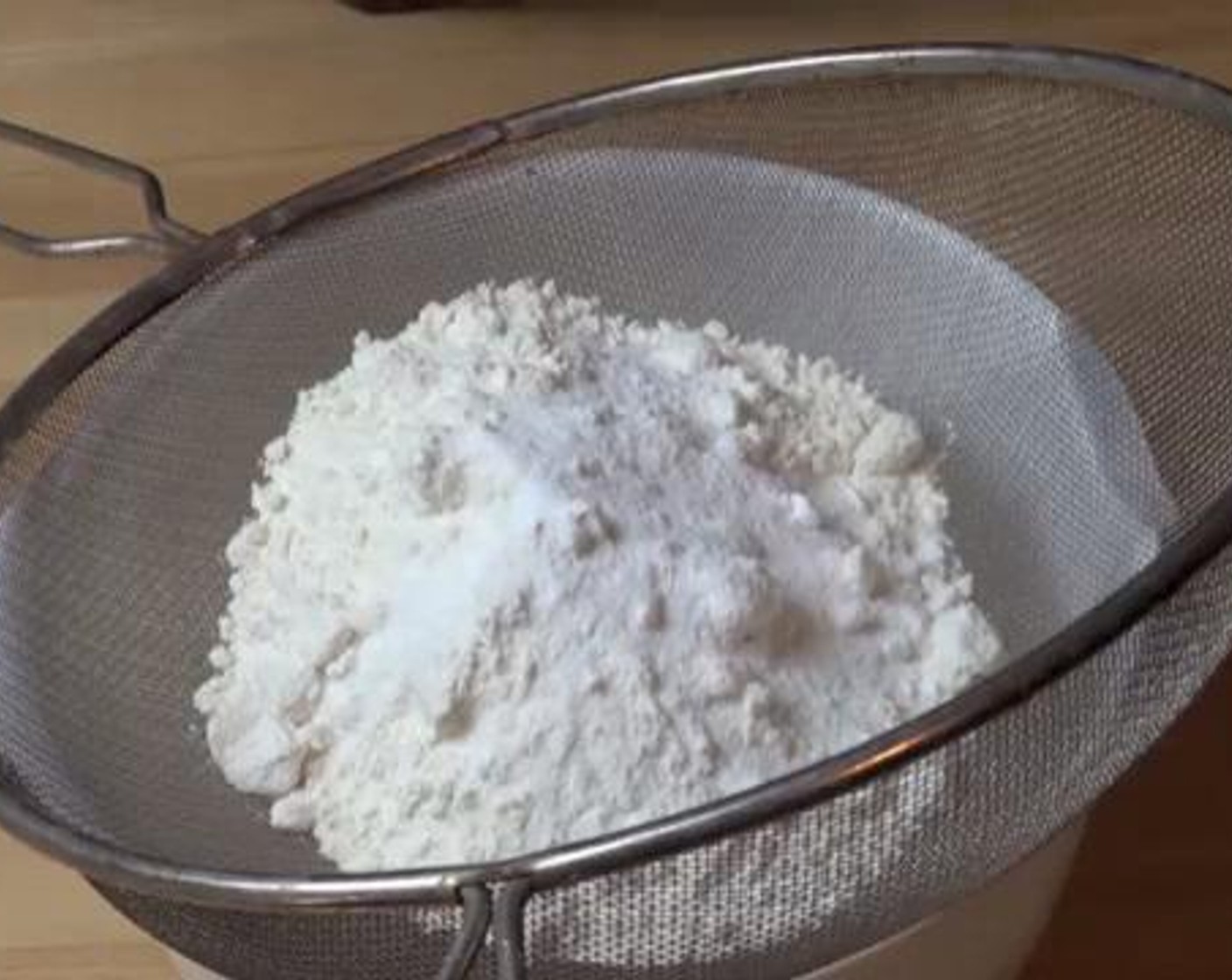 step 4 Into a mixing bowl, sift in the All-Purpose Flour (2 cups), Baking Powder (1 tsp), Salt (1 tsp), and Baking Soda (1/2 tsp)