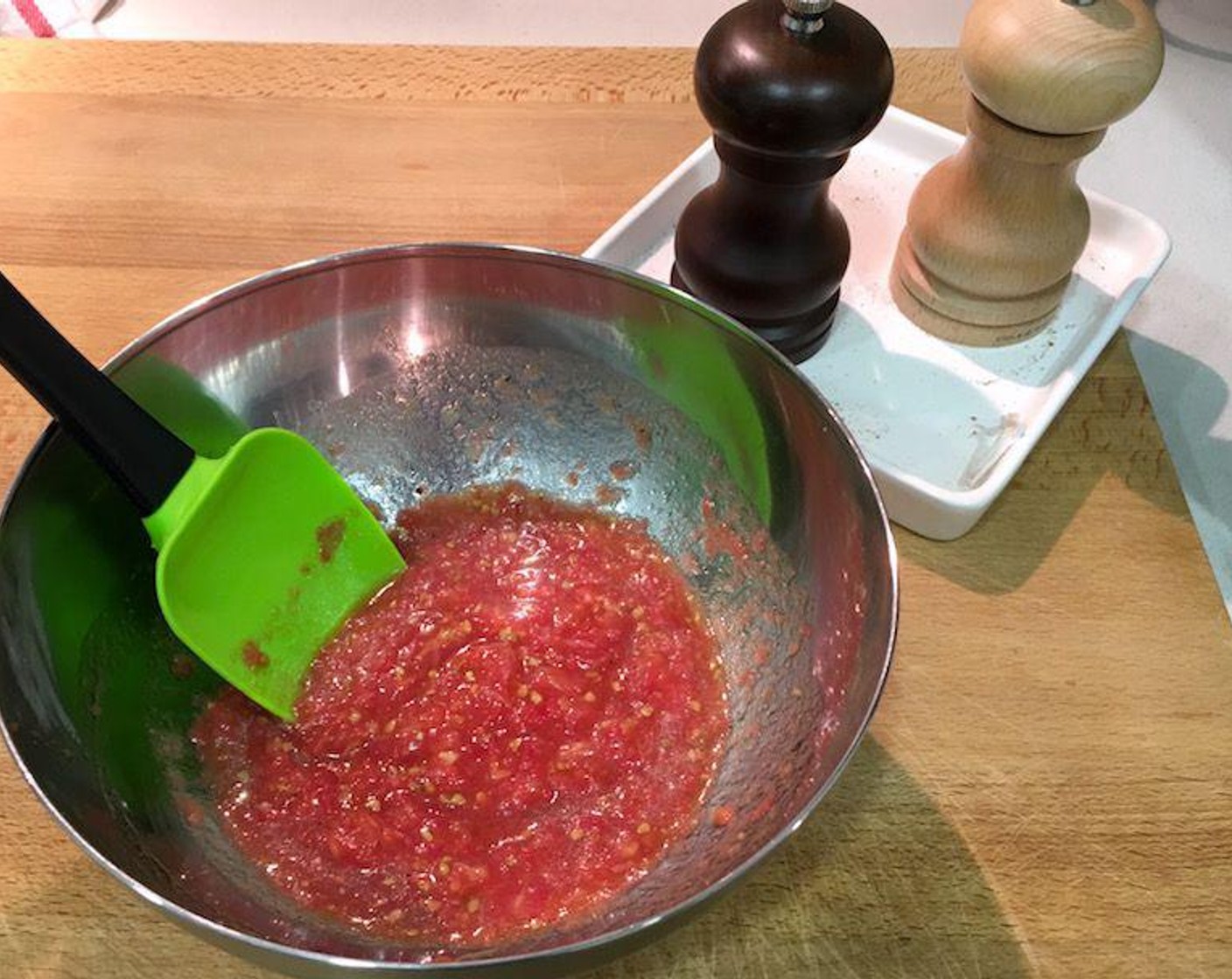 step 4 Season tomato pulp with Extra-Virgin Olive Oil (1 Tbsp), Crushed Red Pepper Flakes (1 dash), Salt (to taste), and Ground Black Pepper (to taste).