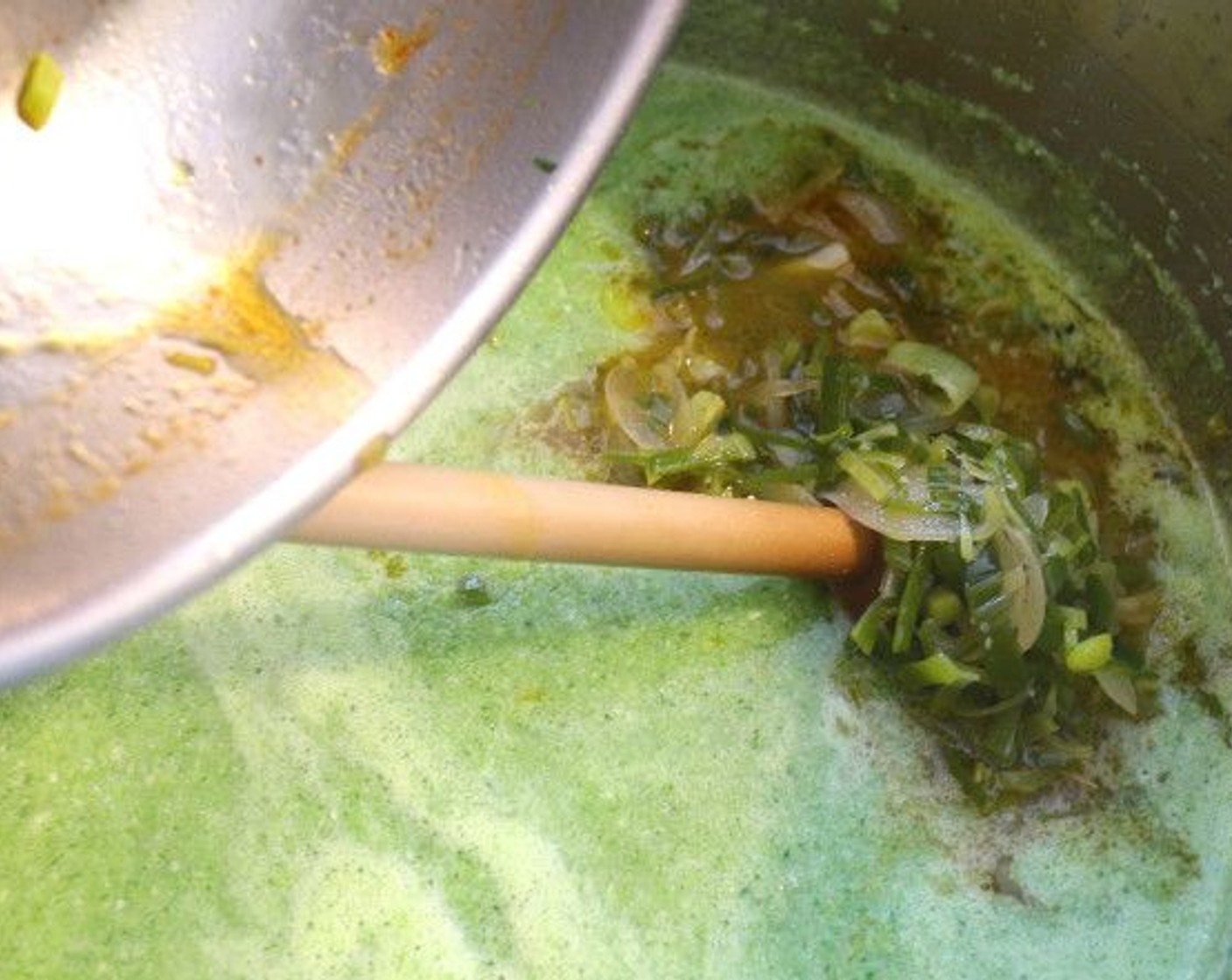step 7 Add the leek and onion mixture in with its stock.