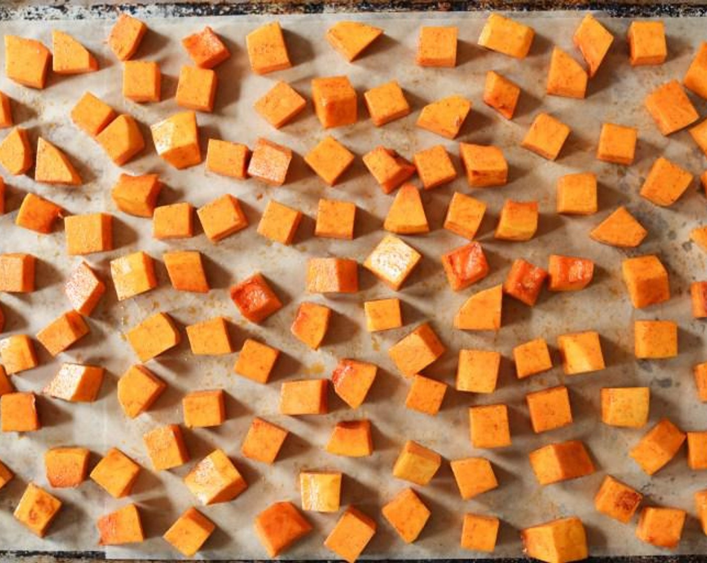 step 2 Place the cubed Butternut Squash (1) in a mixing bowl. Drizzle with Extra-Virgin Olive Oil (1 1/2 Tbsp) and sprinkle with Ground Cinnamon (1/2 tsp). Add a healthy pinch of Kosher Salt (to taste) and Cayenne Pepper (1 pinch) and toss to combine, making sure each cube is coated.