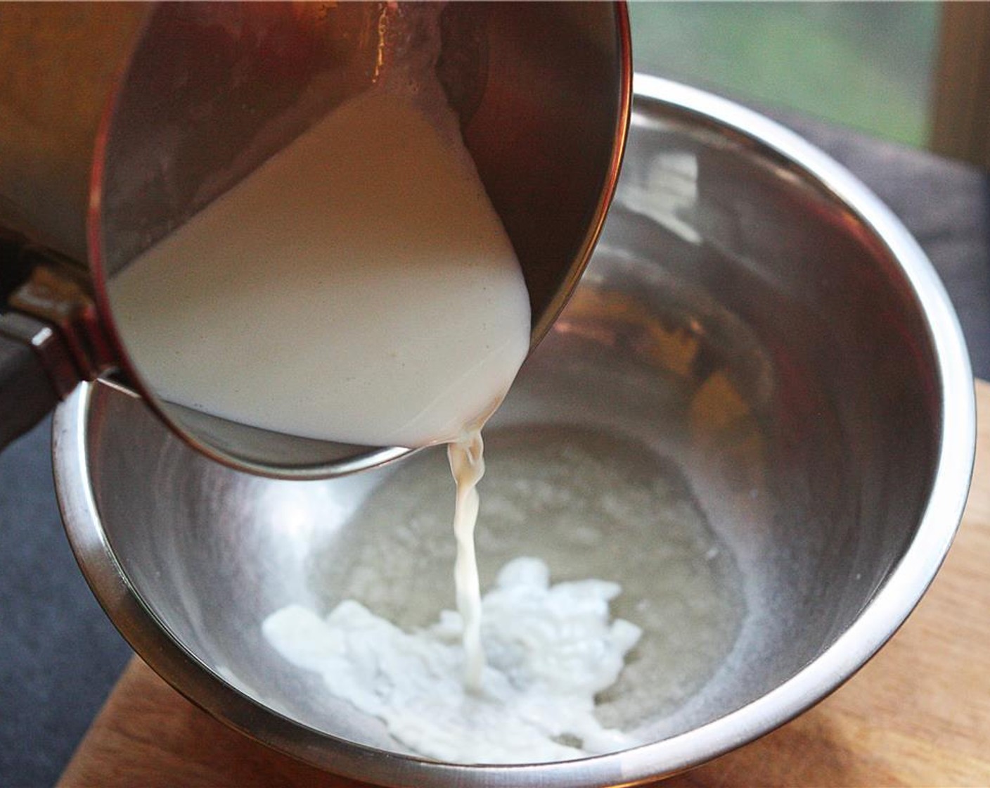 step 10 Place 1/3 cup of Whipping Cream (1 2/3 cups) in a small pot over medium-low heat. Once cream comes to a simmer, pour slowly over the gelatin.