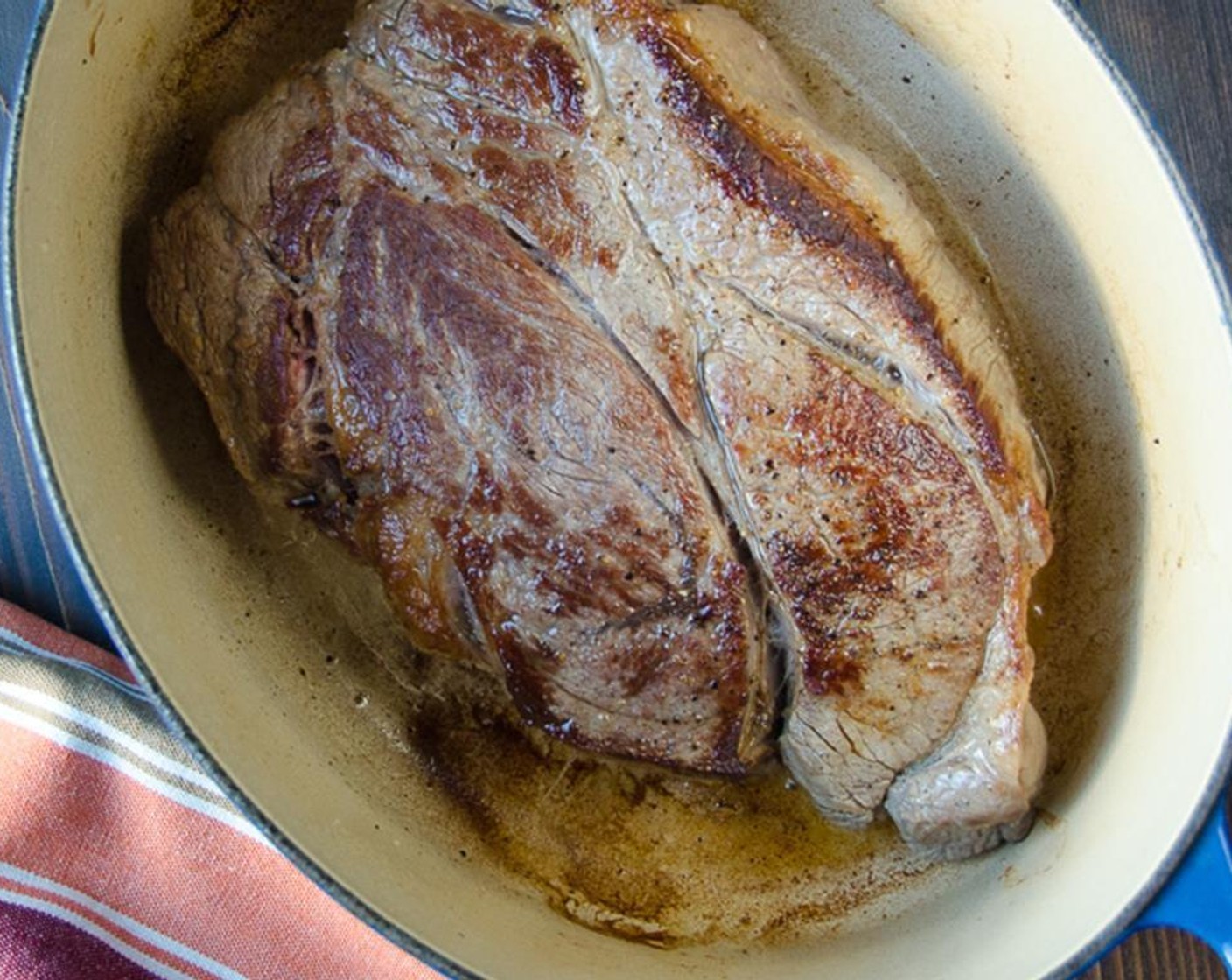 step 3 In a large dutch oven, heat the Olive Oil (3 Tbsp) over medium high heat. When it begins to smoke, sear the meat in the dutch oven for 3 to 4 minutes on each side, until it forms a nice crust.