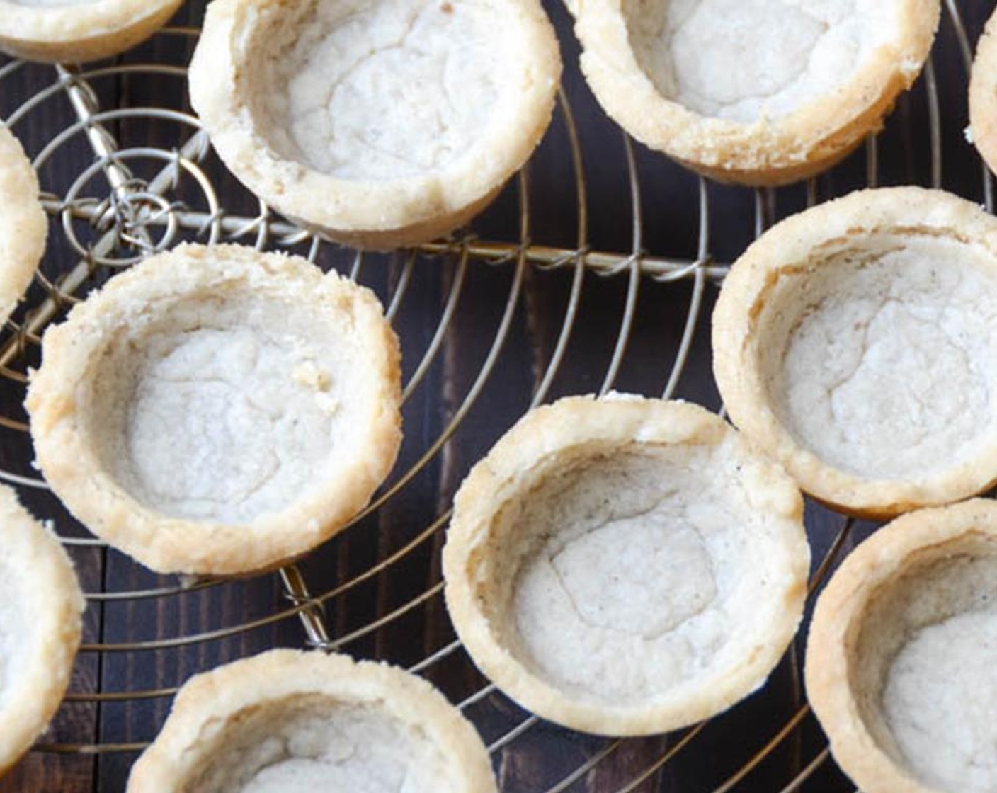 step 10 Carefully slide a very thin knife between the tart and the pan and remove the shortbread crusts. Cool to room temperature on a wire rack.